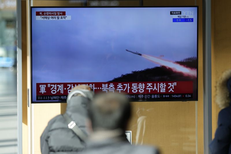 A TV screen shows a report of North Korea's cruise missiles with file footage during a news program at the Seoul Railway Station in Seoul, South Korea, Wednesday. South Korea's military says North Korea fired several cruise missiles into waters off its western coast.