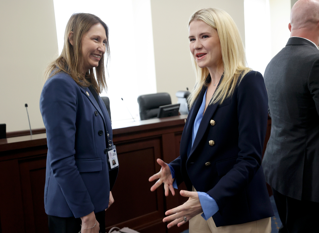 Rep. Karen Peterson, R-Clinton, talks with Elizabeth Smart after Smart asked the Utah Legislature’s Higher Education Appropriations Subcommittee to fund the Smart Defense sexual assault prevention and self-defense course at all state universities in the Senate building in Salt Lake City on Wednesday.