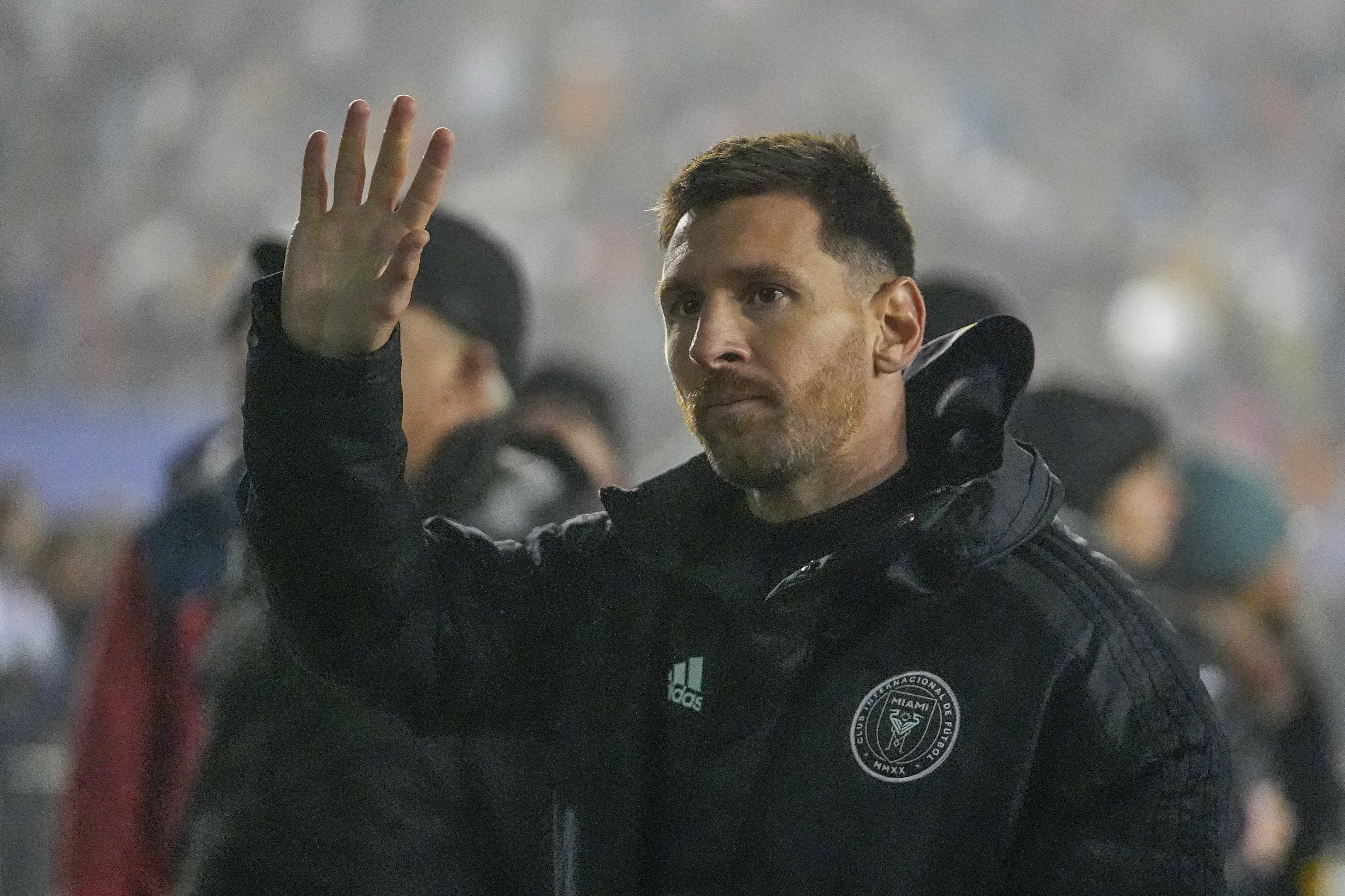 Inter Miami forward Lionel Messi acknowledges supporters as he leaves the pitch during the second half of a preseason friendly MLS soccer match against FC Dallas, Monday, Jan. 22, 2024, at the Cotton Bowl in Dallas. FC Dallas won 1-0. 