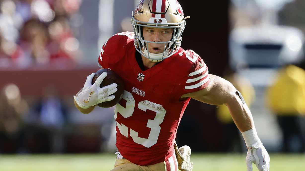 FILE - San Francisco 49ers running back Christian McCaffrey (23) runs against the Tampa Bay Buccaneers during the first half of an NFL football game in Santa Clara, Calif., Sunday, Nov. 19, 2023. Christian McCaffrey is a finalist for The Associated Press 2023 NFL Most Valuable Player and Offensive Player of the Year awards. The winners will be announced at NFL Honors on Feb. 8.