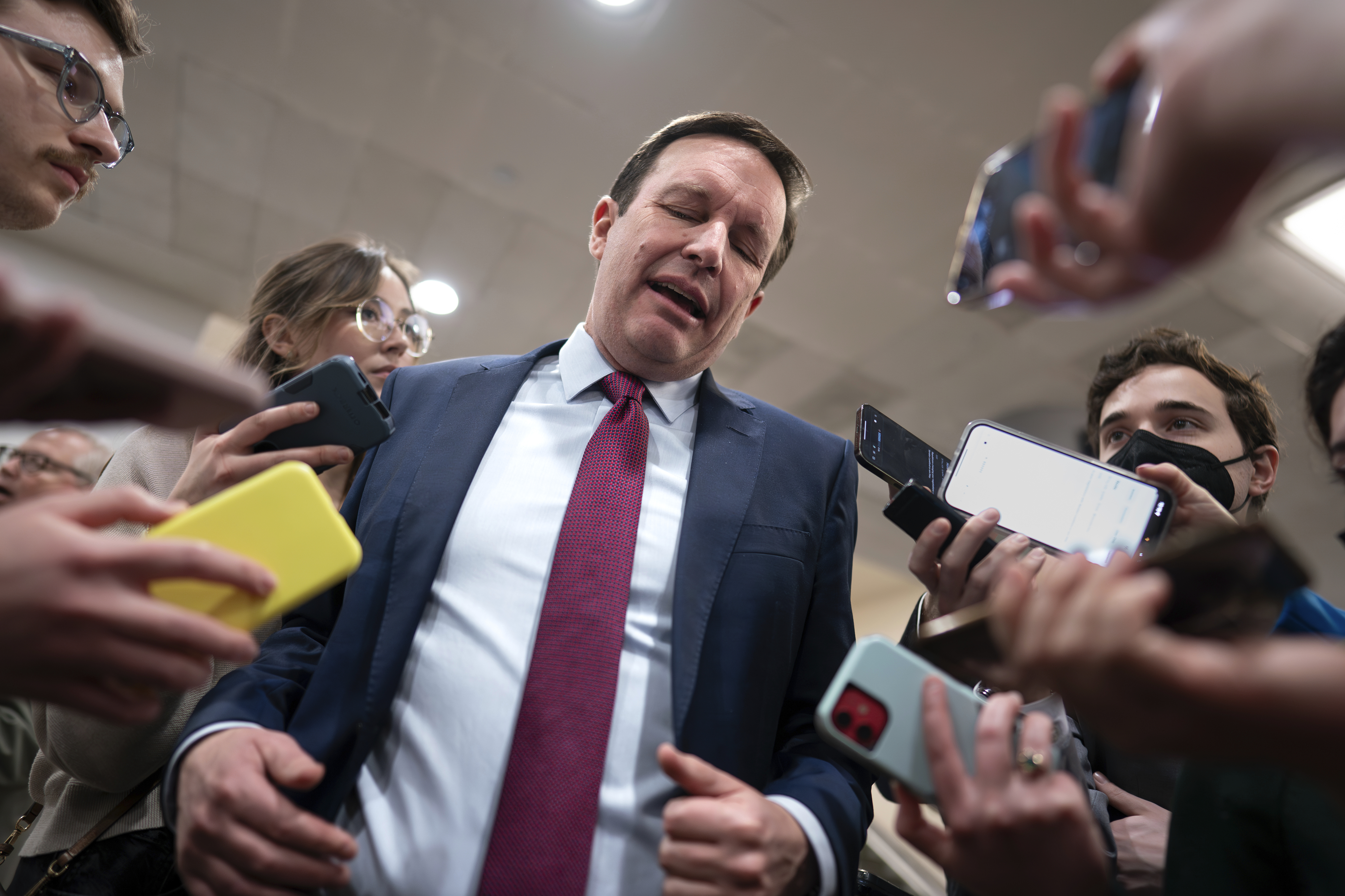 Sen. Chris Murphy, D-Conn., speaks with reporters at the Capitol in Washington, Thursday. Any bipartisan border deal could be doomed because of resistance from former President Donald Trump.