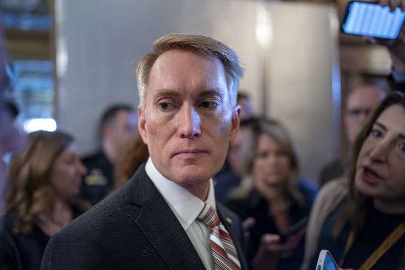 Sen. James Lankford, R-Okla., the lead GOP negotiator on a border-foreign aid package, speaks with reporters outside the chamber at the Capitol in Washington, Thursday. Any bipartisan border deal could be doomed because of resistance from former President Donald Trump.