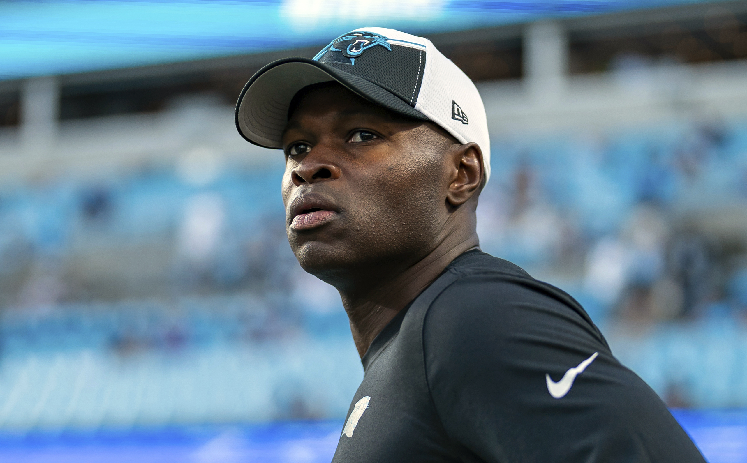 FILE - Carolina Panthers defensive coordinator Ejiro Evero looks on before an NFL football game against the New Orleans Saints Monday, Sept. 18, 2023, in Charlotte, N.C. Evero met again with the Atlanta Falcons to discuss their head coaching vacancy, Wednesday, Jan. 24, 2024, joining Rams assistant Raheem Morris and former Patriots coach Bill Belichick in receiving second interviews.