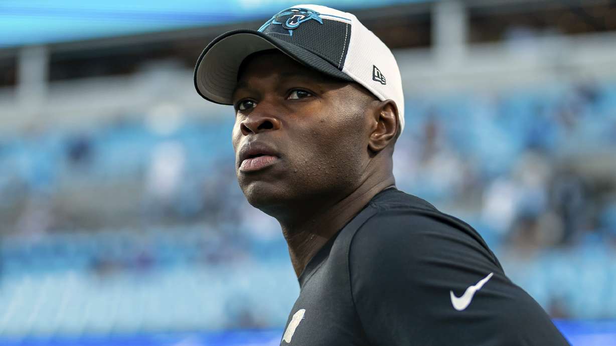 FILE - Carolina Panthers defensive coordinator Ejiro Evero looks on before an NFL football game against the New Orleans Saints Monday, Sept. 18, 2023, in Charlotte, N.C. Evero met again with the Atlanta Falcons to discuss their head coaching vacancy, Wednesday, Jan. 24, 2024, joining Rams assistant Raheem Morris and former Patriots coach Bill Belichick in receiving second interviews.