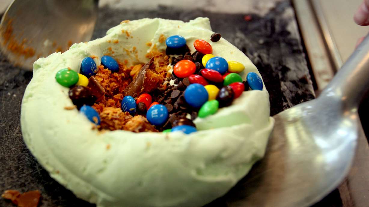 Candy is mixed into mint ice cream at Cold Stone Creamery in Bountiful on July 5, 2006. Three Cold Stone Creamery locations in Utah have been fined $42,714 for violating federal child labor laws, the U.S. Department of Labor announced Thursday.