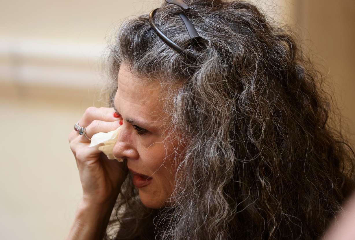 Sen. Jennifer Plumb, D-Salt Lake City, wipes tears from her eyes after speaking in opposition to HB257 in the Senate chamber at the Capitol in Salt Lake City on Thursday.