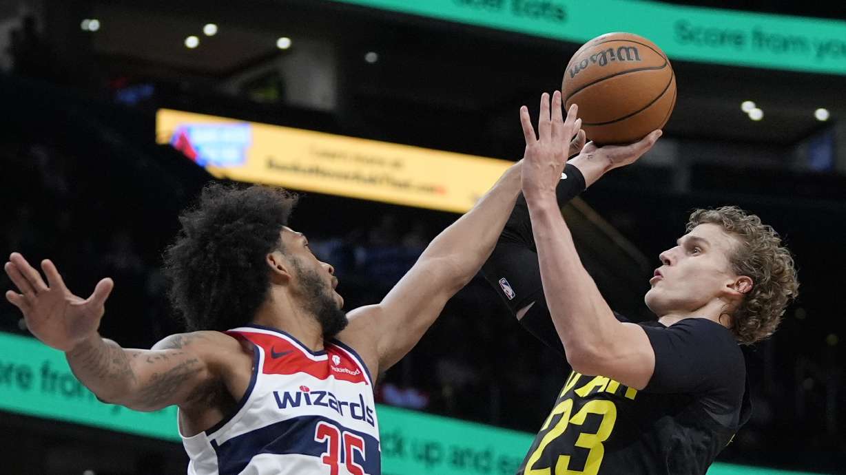 Utah Jazz forward Lauri Markkanen (23) looks to shoot over Washington Wizards forward Marvin Bagley III (35) during the first half of an NBA basketball game Thursday, Jan. 25, 2024, in Washington. (AP Photo/Mark Schiefelbein)