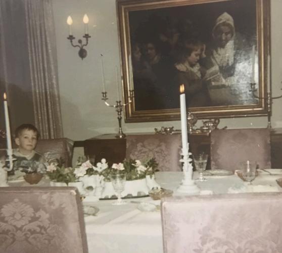 John Wood, 7, sits in front of John Opie's painting "The Schoolmistress" six months before it was stolen from his family's Newark, N.J., house in 1969.
