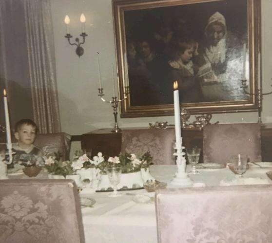 John Wood, 7, sits in front of John Opie's painting "The Schoolmistress" six months before it was stolen from his family's Newark, N.J., house in 1969.
