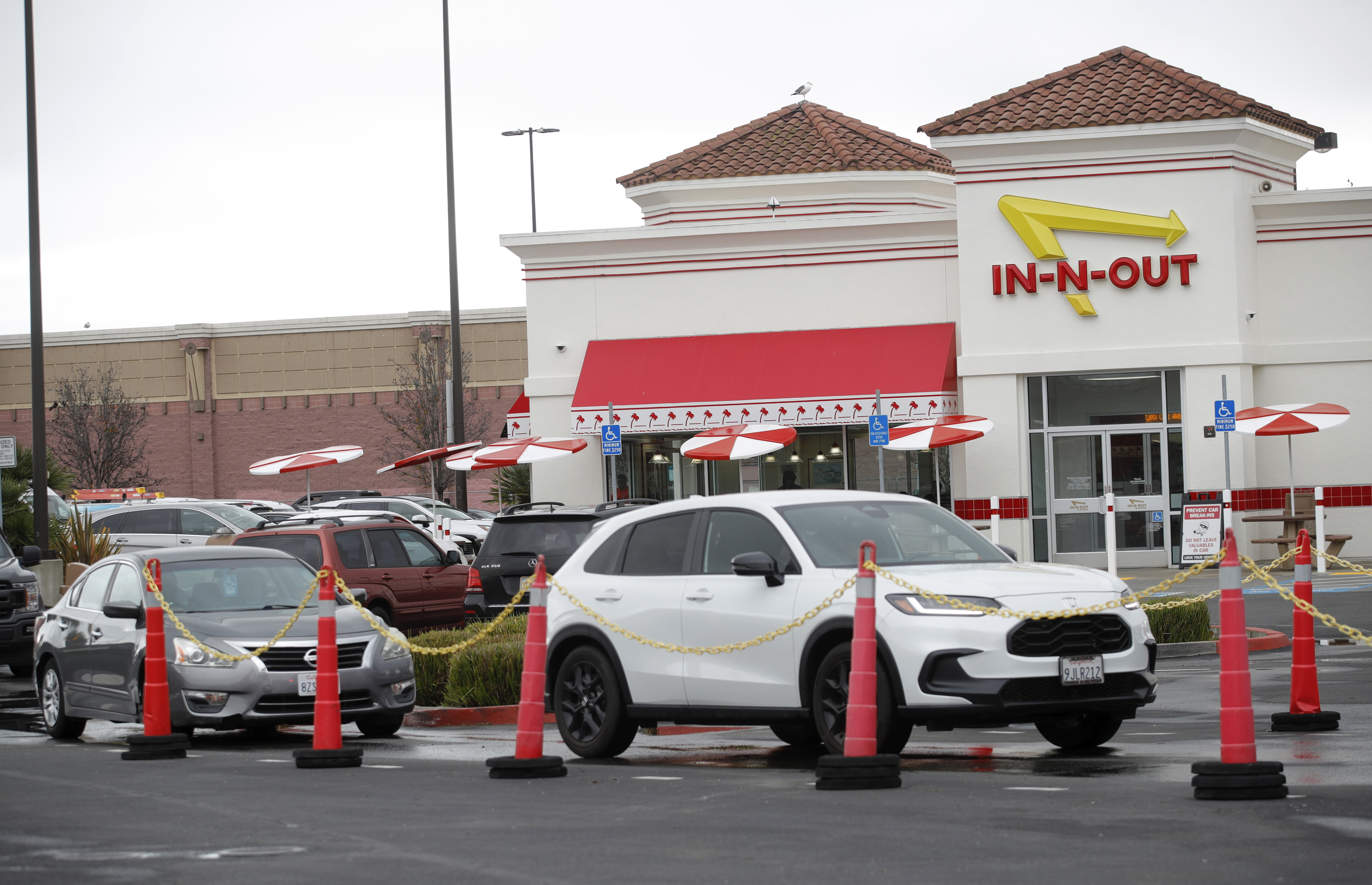The In-N-Out drive-thru off Hegenberger Road in Oakland, Calif., on Monday. In-N-Out will close its only restaurant in Oakland because of a wave of car break-ins, property damage, theft and armed robberies, on March 24.