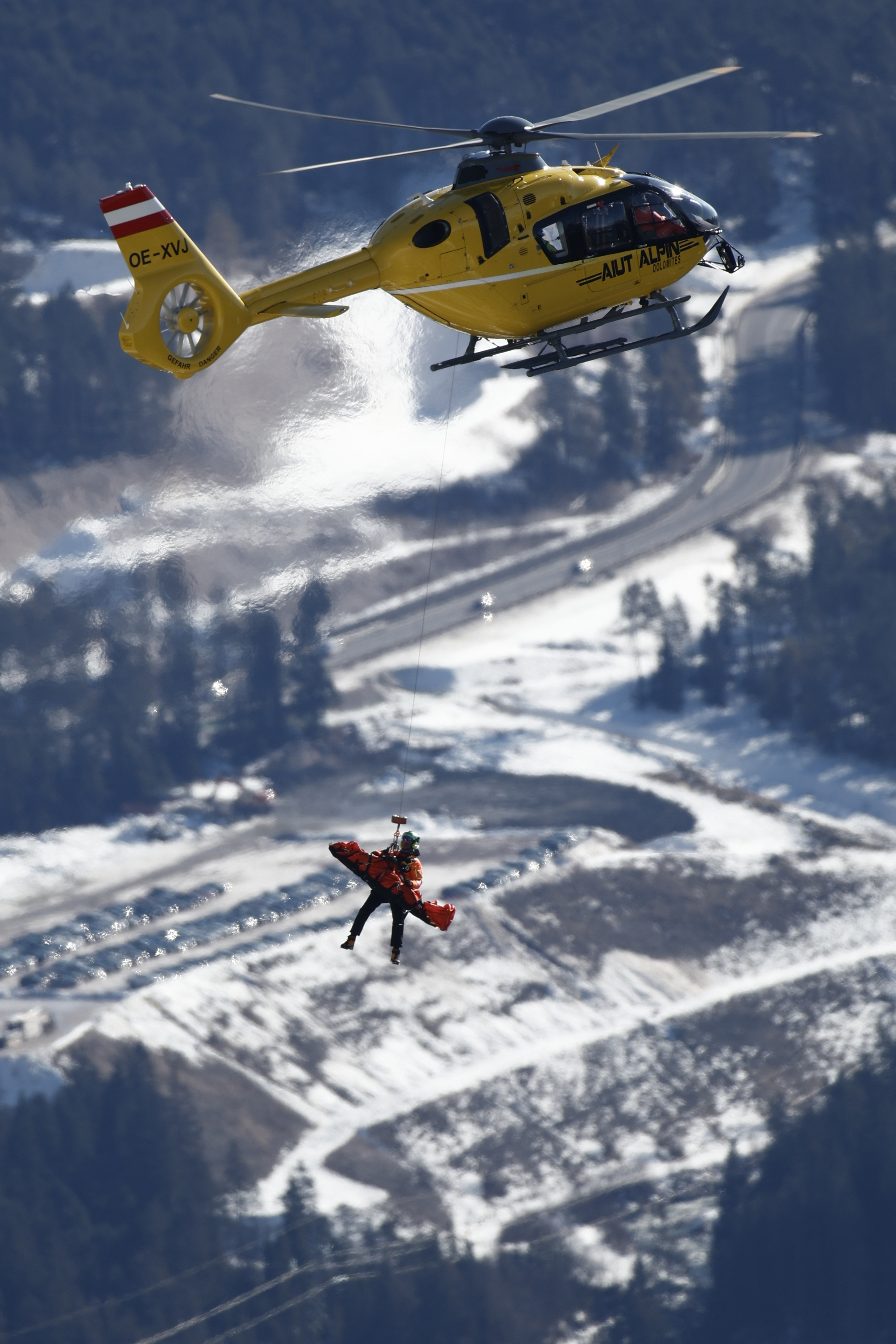 Rescue helicopter evacuate United States' Isabella Wright after she crashed during an alpine ski, women's World Cup downhill race, in Cortina d'Ampezzo, Italy, Saturday, Jan. 27, 2024. 