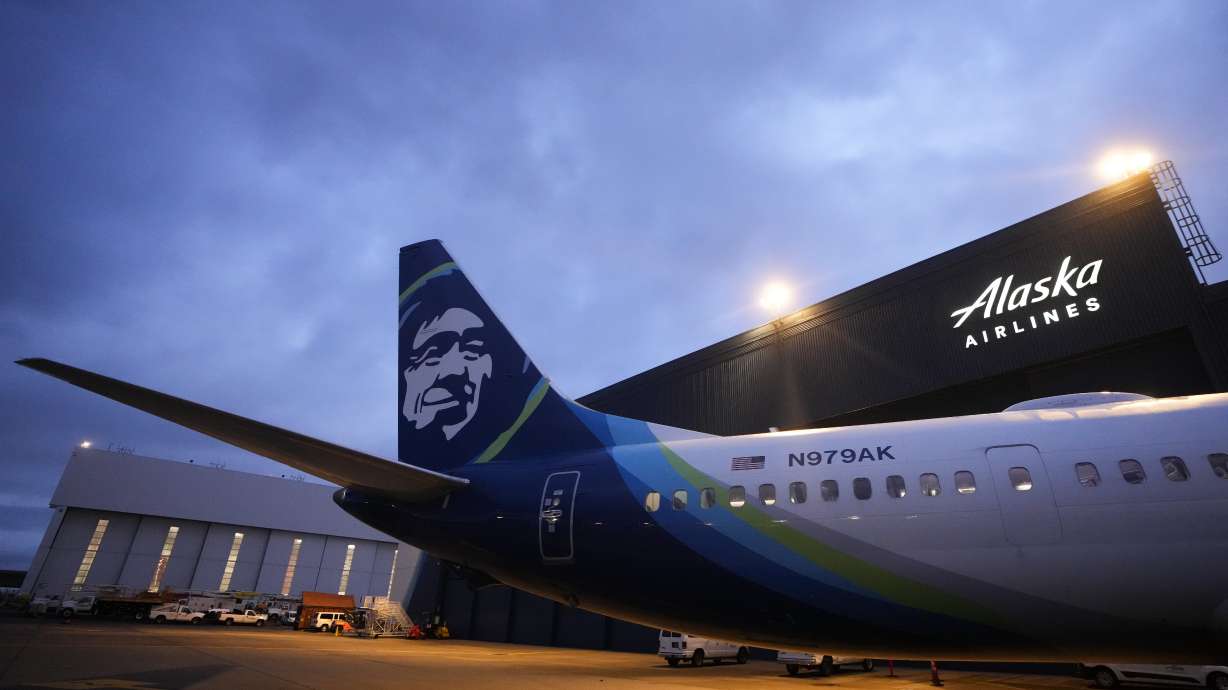 An Alaska Airlines Boeing 737 Max 9 awaits inspection at the airline's hangar at Seattle-Tacoma International Airport on Jan. 10, in SeaTac, Wash. Alaska Airlines has begun flying Boeing 737 Max 9 jetliners again for the first time Friday since they were grounded after a panel blew out of the side of one of the airline's planes.
