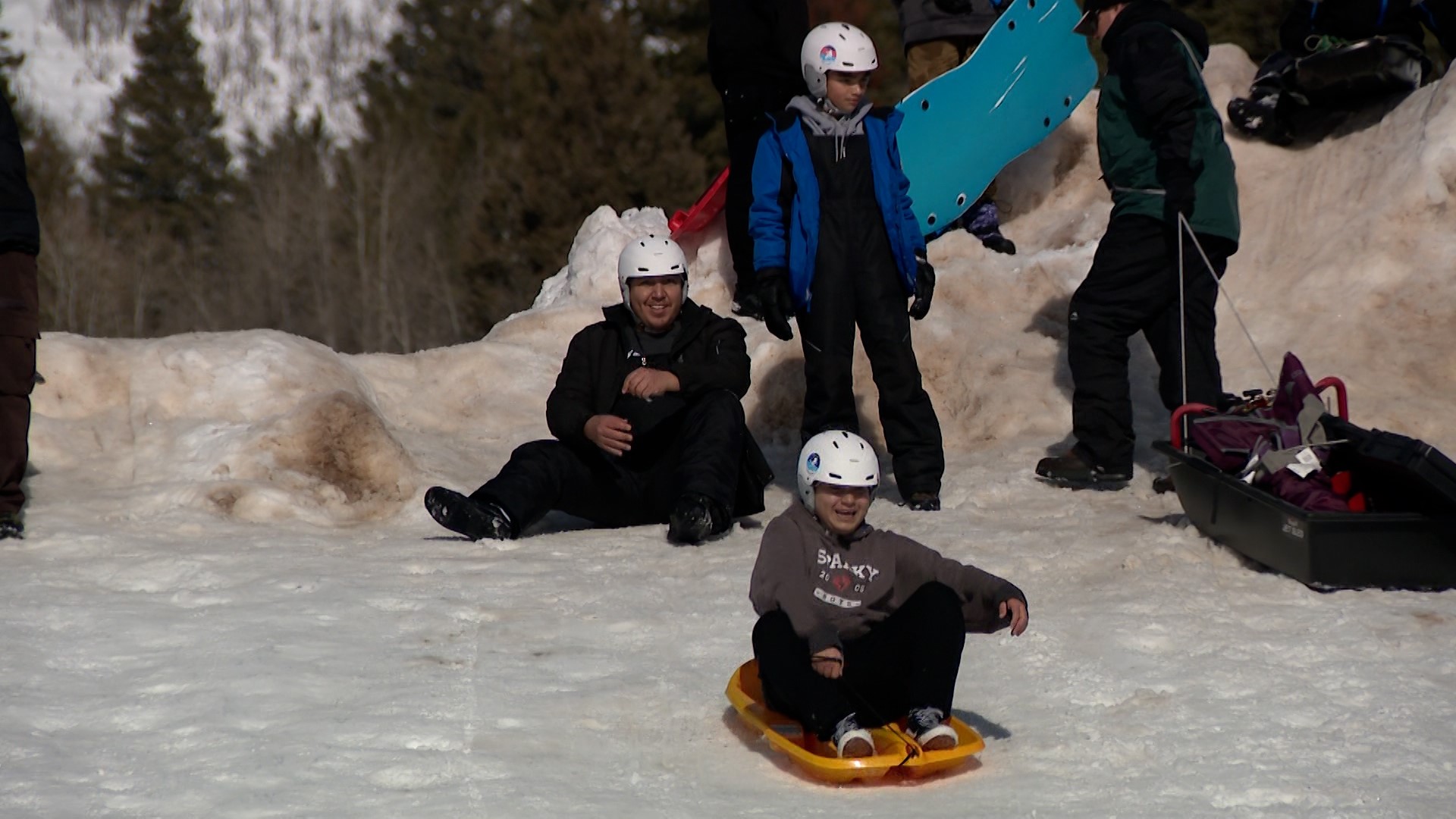 A church group from American Fork came to Tibble Fork Reservoir in American Fork Canyon Saturday morning to give sledding a try.