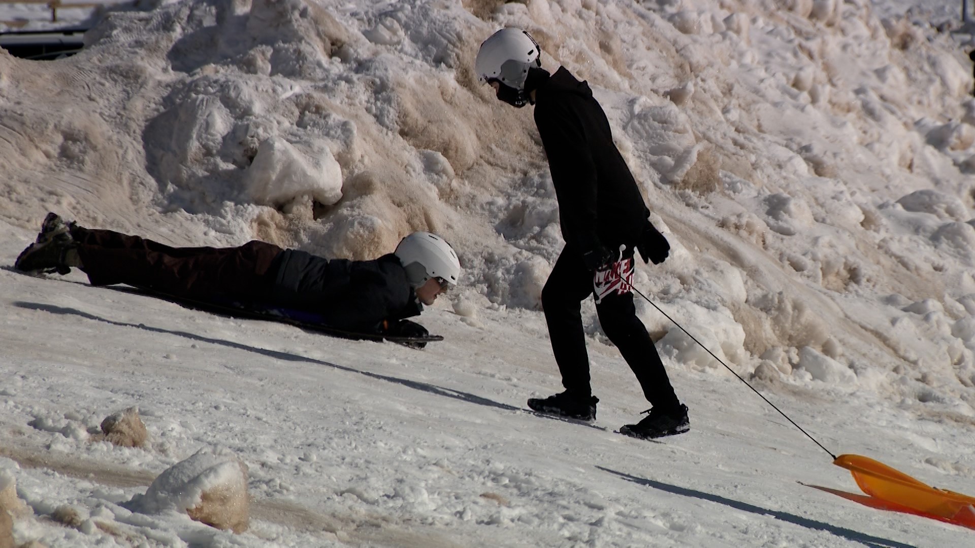 Intermountain Healthcare provided the church group with new helmets for sledding.