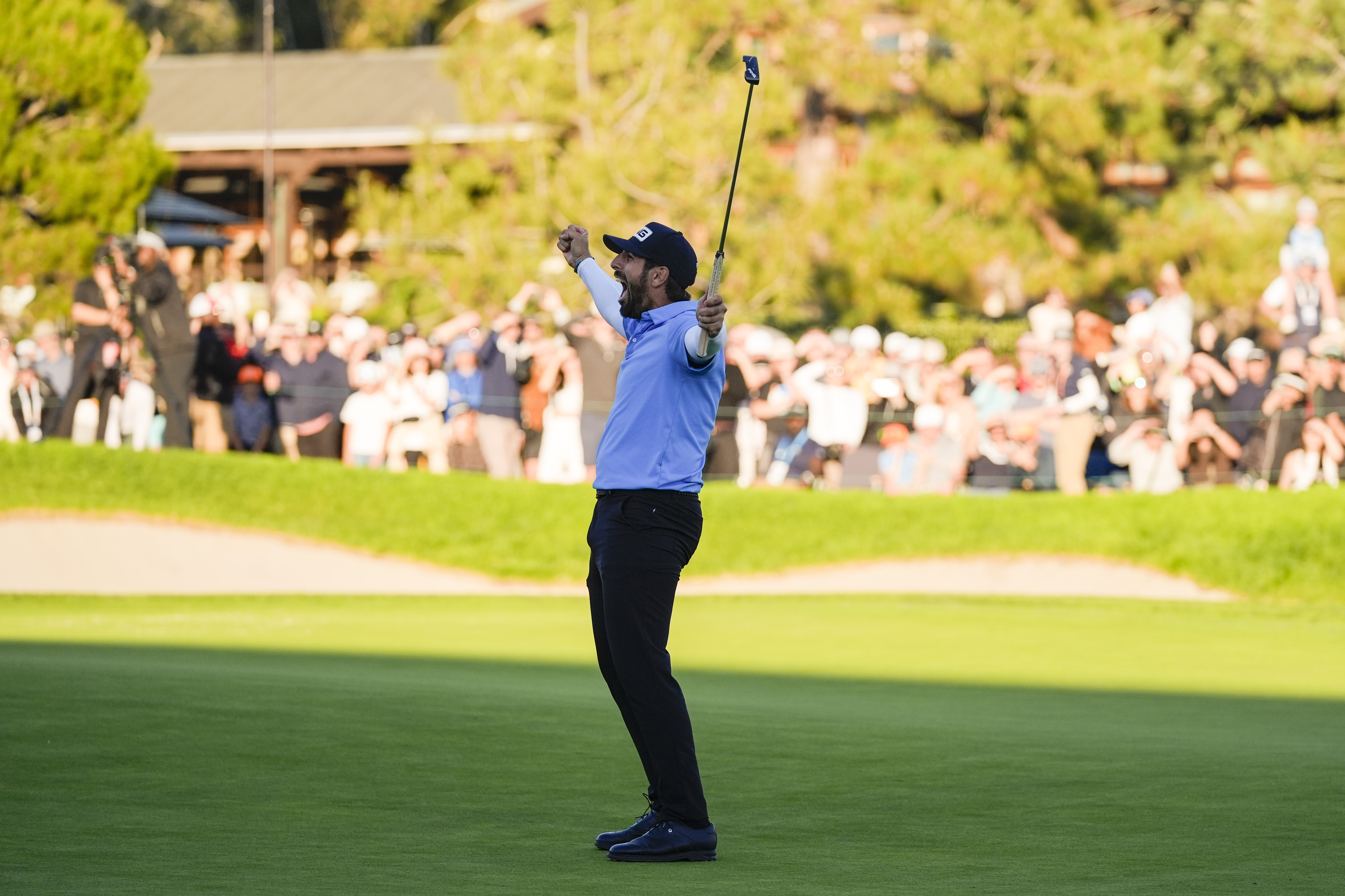 Matthieu Pavon celebrates on the 18th green of the South Course at Torrey Pines after winning the Farmers Insurance Open golf tournament, Saturday, Jan. 27, 2024, in San Diego.