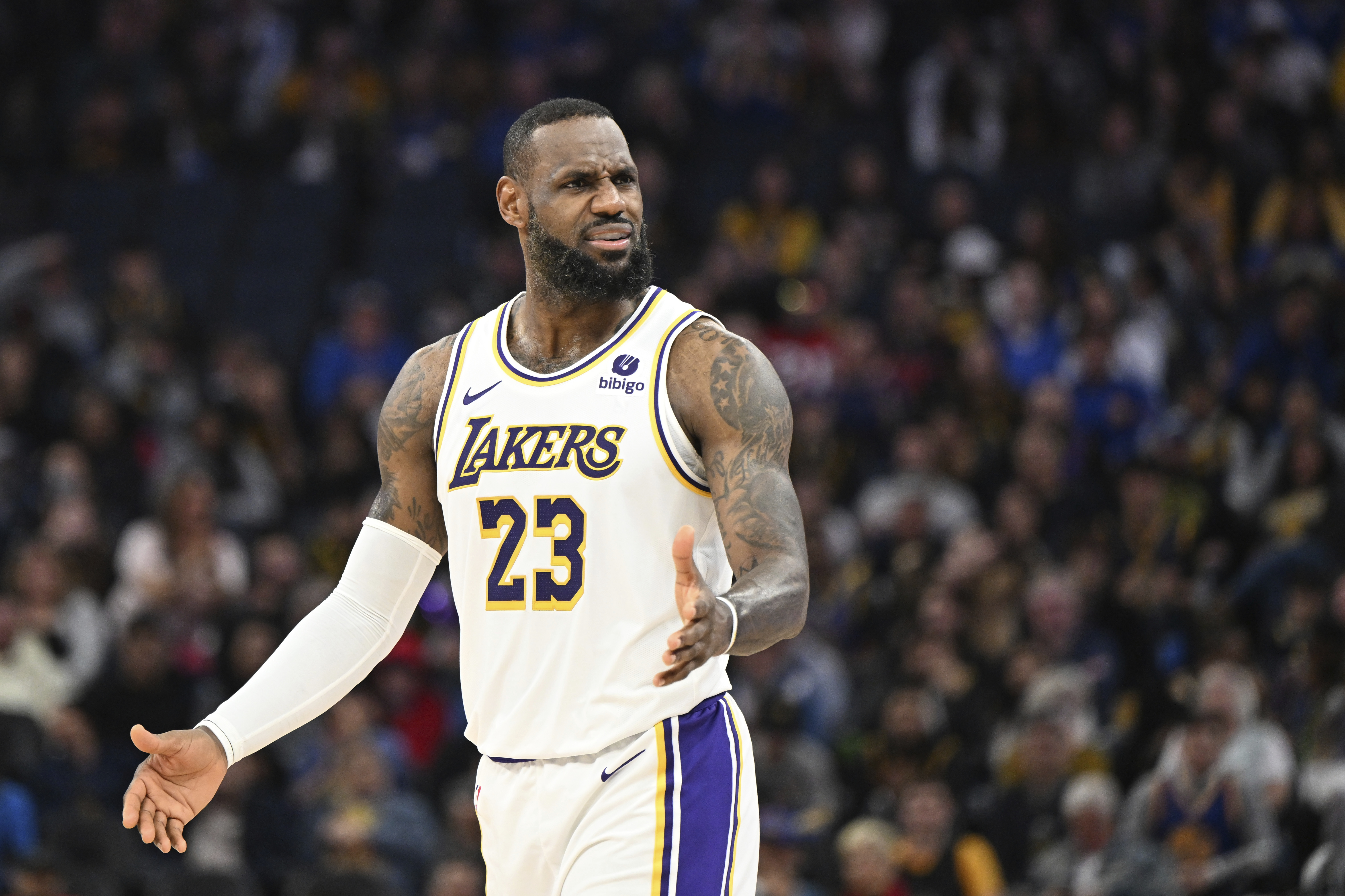 Los Angeles Lakers forward LeBron James reacts after a referee's call during the first half of an NBA basketball game against the Golden State Warriors, Saturday, Jan. 27, 2024, in San Francisco. 