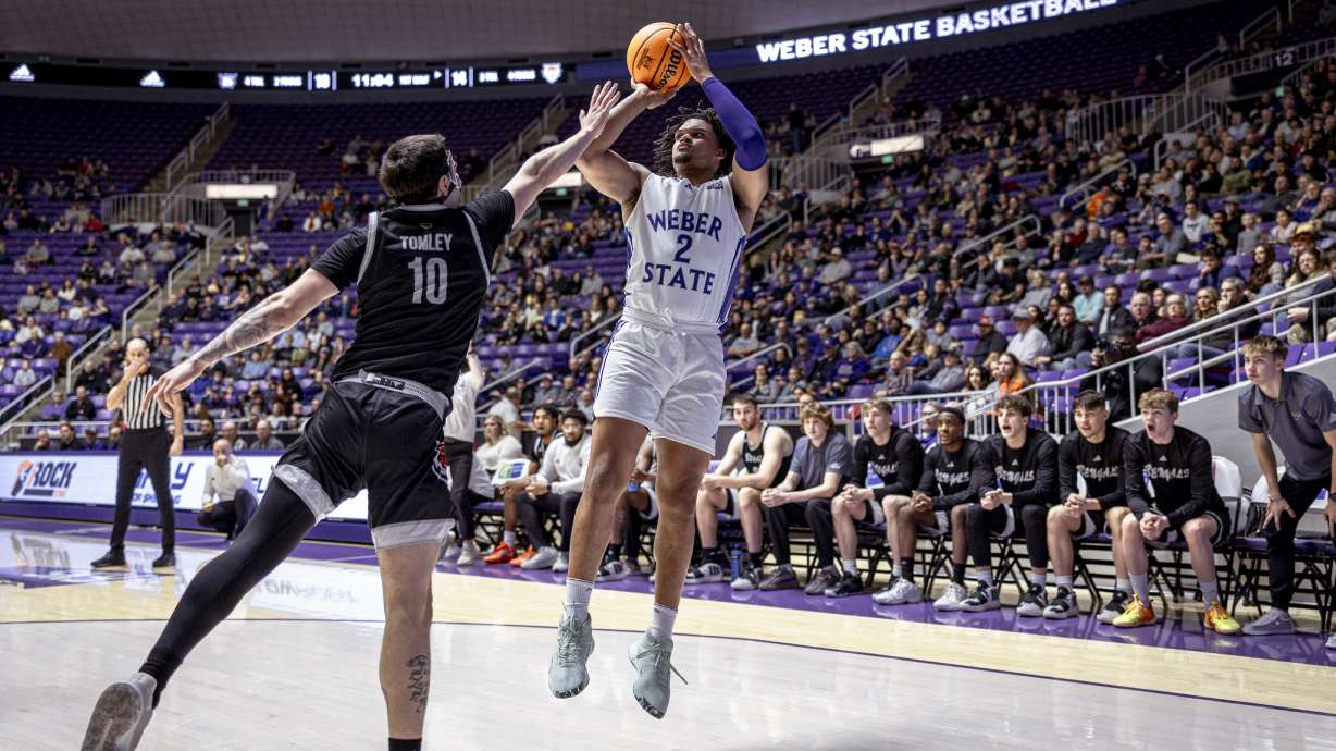 Weber State's Dillon Jones puts up a shot against Idaho during a Big Sky men's basketball game, Saturday, Jan. 27, 2024 in Ogden, Utah.