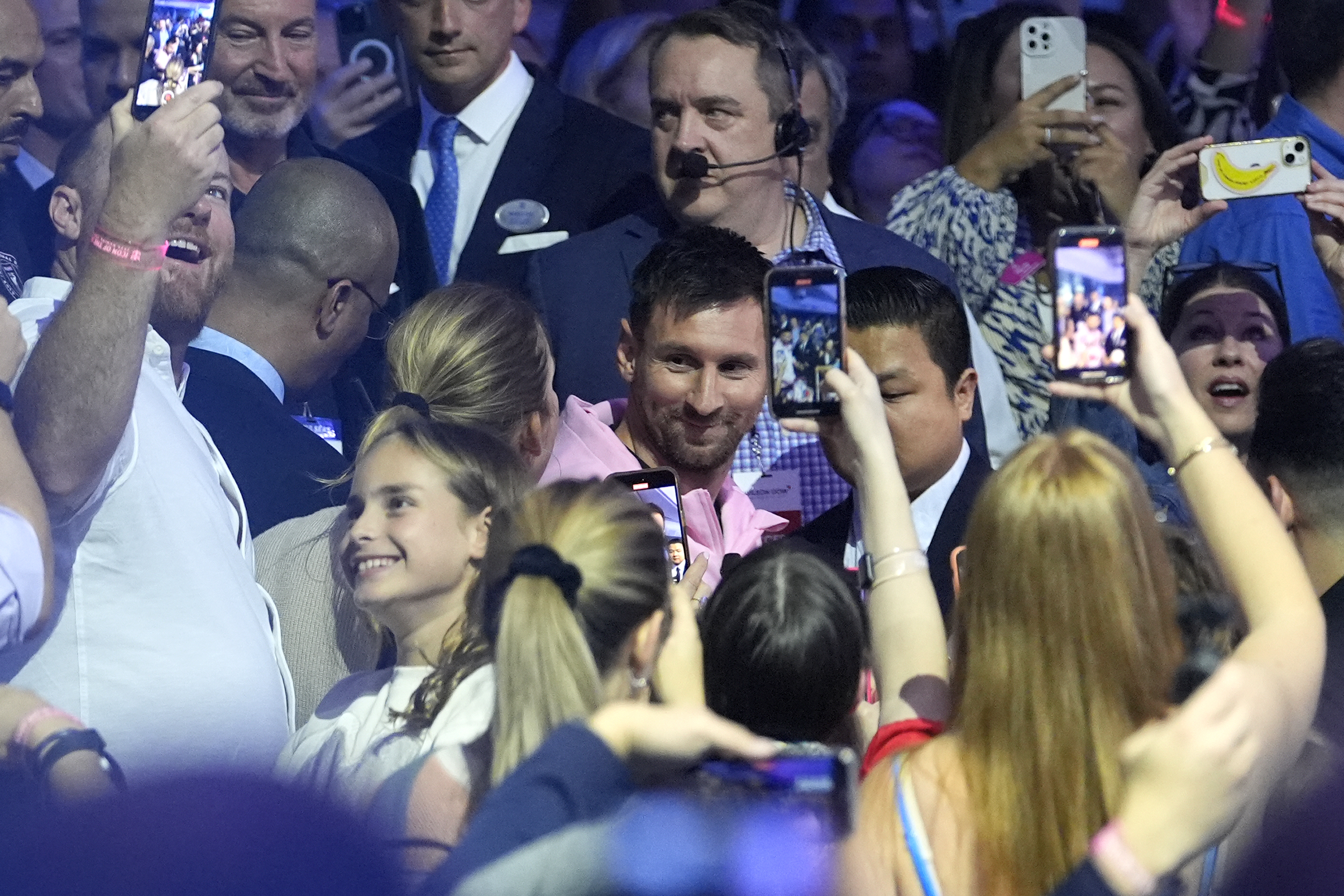 Inter Miami soccer player Lionel Messi walks through the crowd as he arrives for a naming ceremony for Royal Caribbean International's new cruise ship Icon of the Seas, Tuesday, Jan. 23, 2024, in Miami. The cruise line has named Messi as the official icon of the Icon of the Seas ship. 