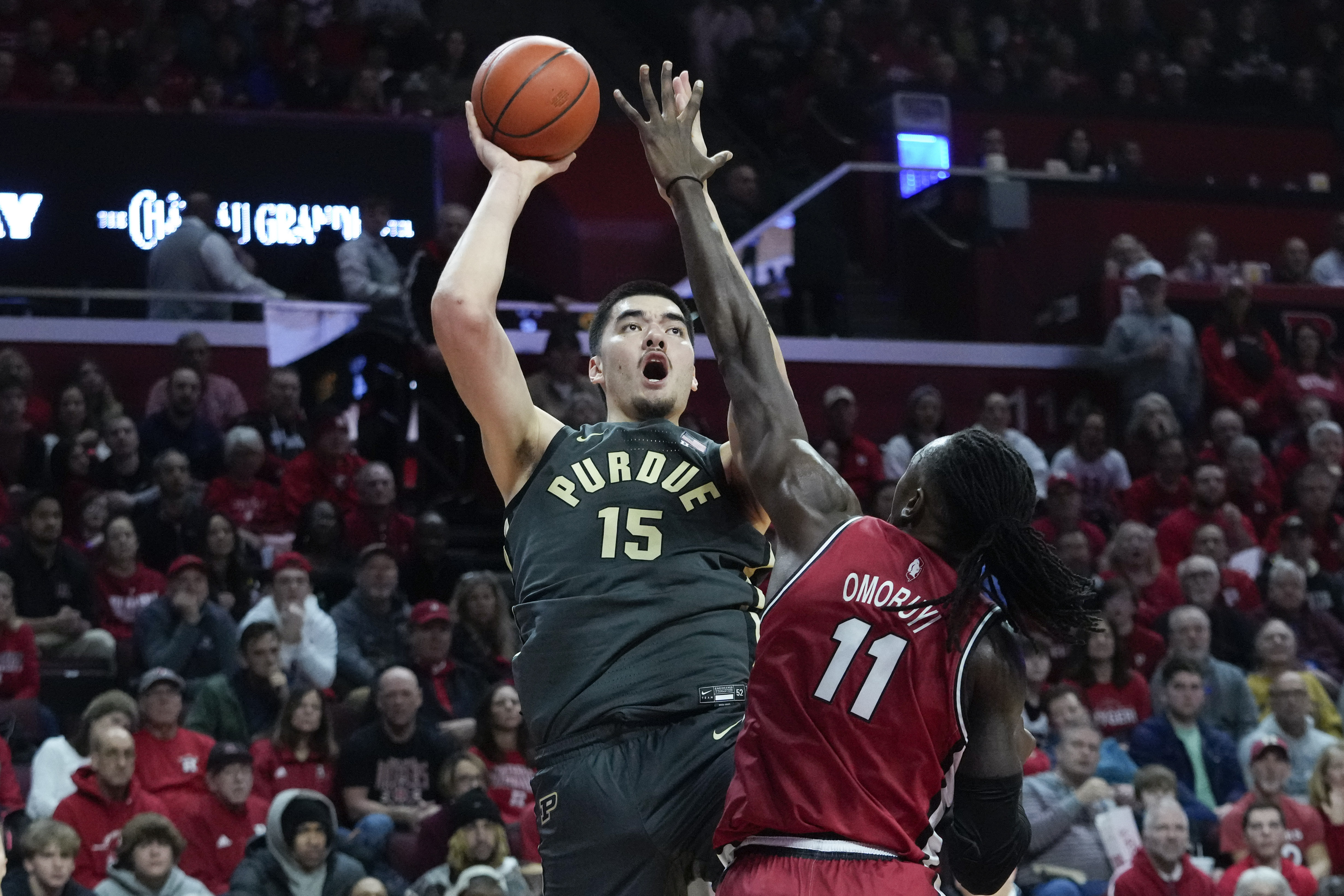 Purdue center Zach Edey (15) shoots over Rutgers center Clifford Omoruyi (11) in the first half off an NCAA college basketball game, Sunday, Jan. 28, 2024, in Piscataway, N.J. 