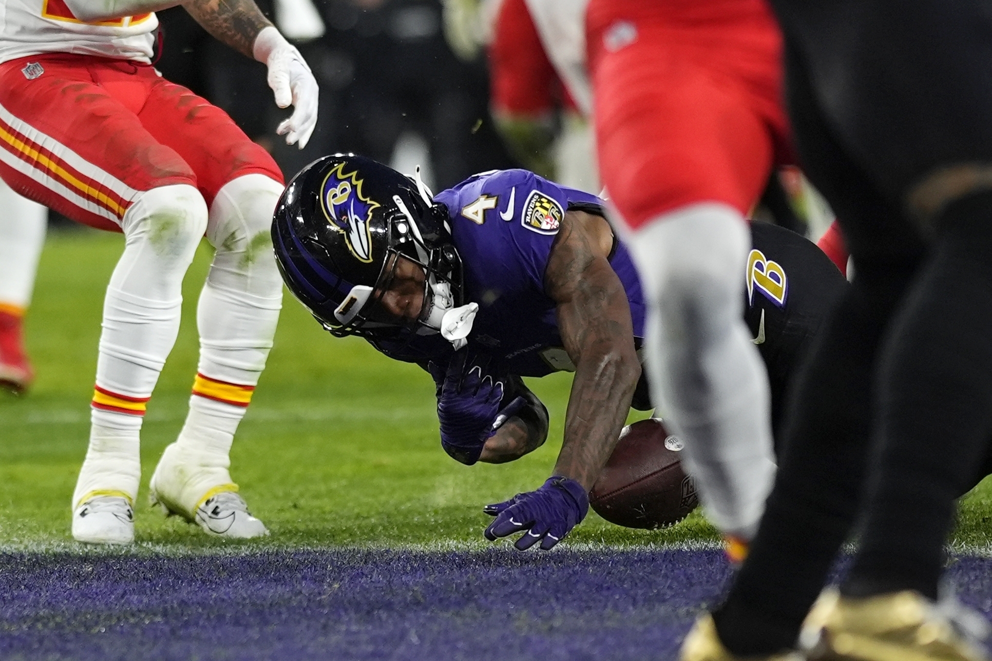 Baltimore Ravens wide receiver Zay Flowers (4) fumbles into the end zone during the second half of the AFC Championship NFL football game against the Kansas City Chiefs, Sunday, Jan. 28, 2024, in Baltimore. 