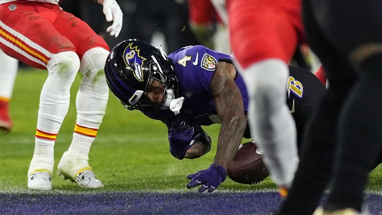 Baltimore Ravens wide receiver Zay Flowers (4) fumbles into the end zone during the second half of the AFC Championship NFL football game against the Kansas City Chiefs, Sunday, Jan. 28, 2024, in Baltimore.
