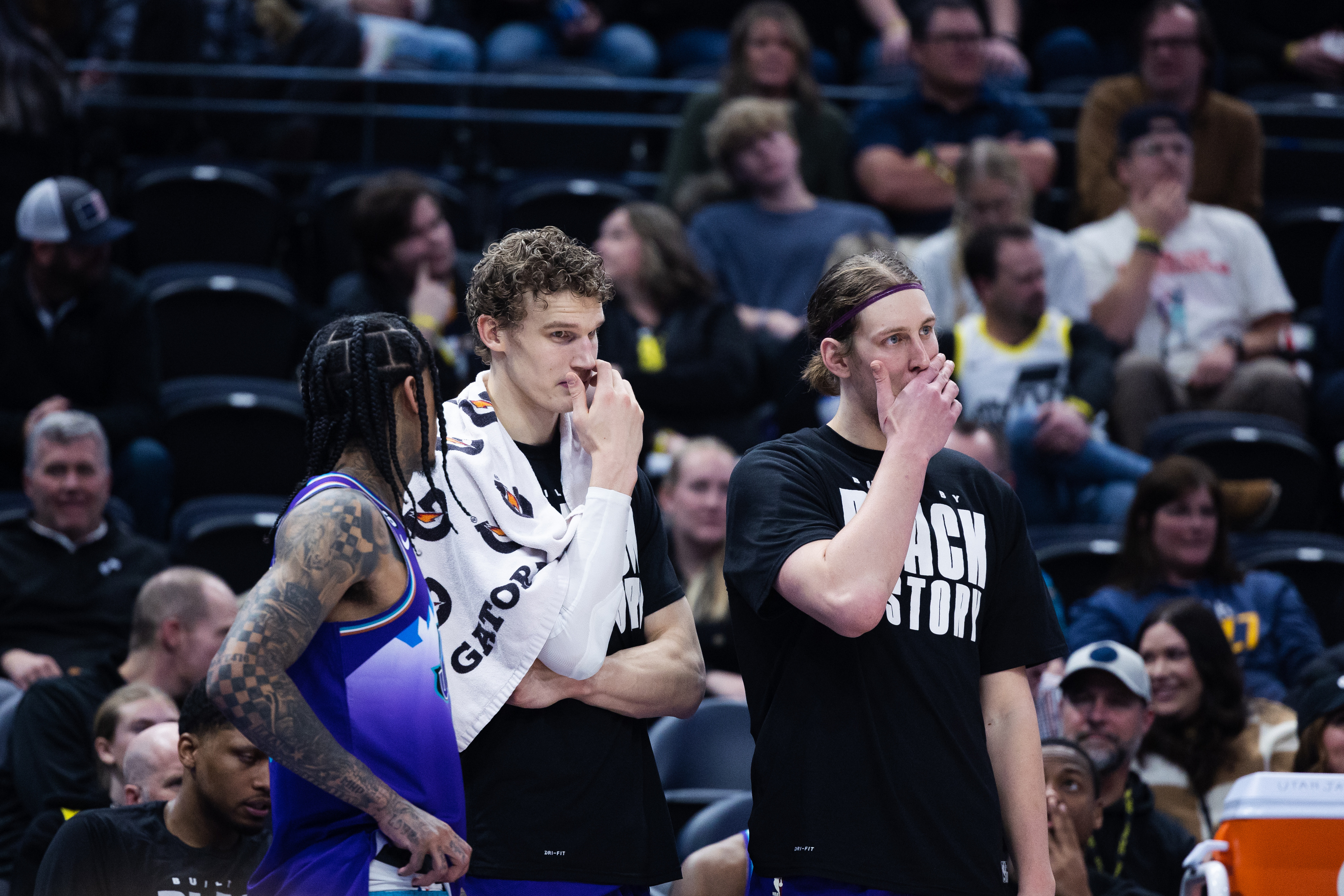 Utah Jazz forward Kelly Olynyk (41), Utah Jazz forward Lauri Markkanen (23) and Utah Jazz guard Jordan Clarkson (00) watch from the bench during an NBA game at Vivint Arena in Salt Lake City on Wednesday, Feb. 8, 2023.