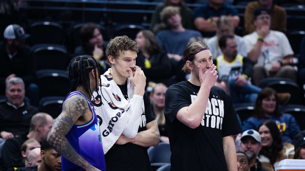 Utah Jazz forward Kelly Olynyk (41), Utah Jazz forward Lauri Markkanen (23) and Utah Jazz guard Jordan Clarkson (00) watch from the bench during an NBA game at Vivint Arena in Salt Lake City on Wednesday, Feb. 8, 2023.
