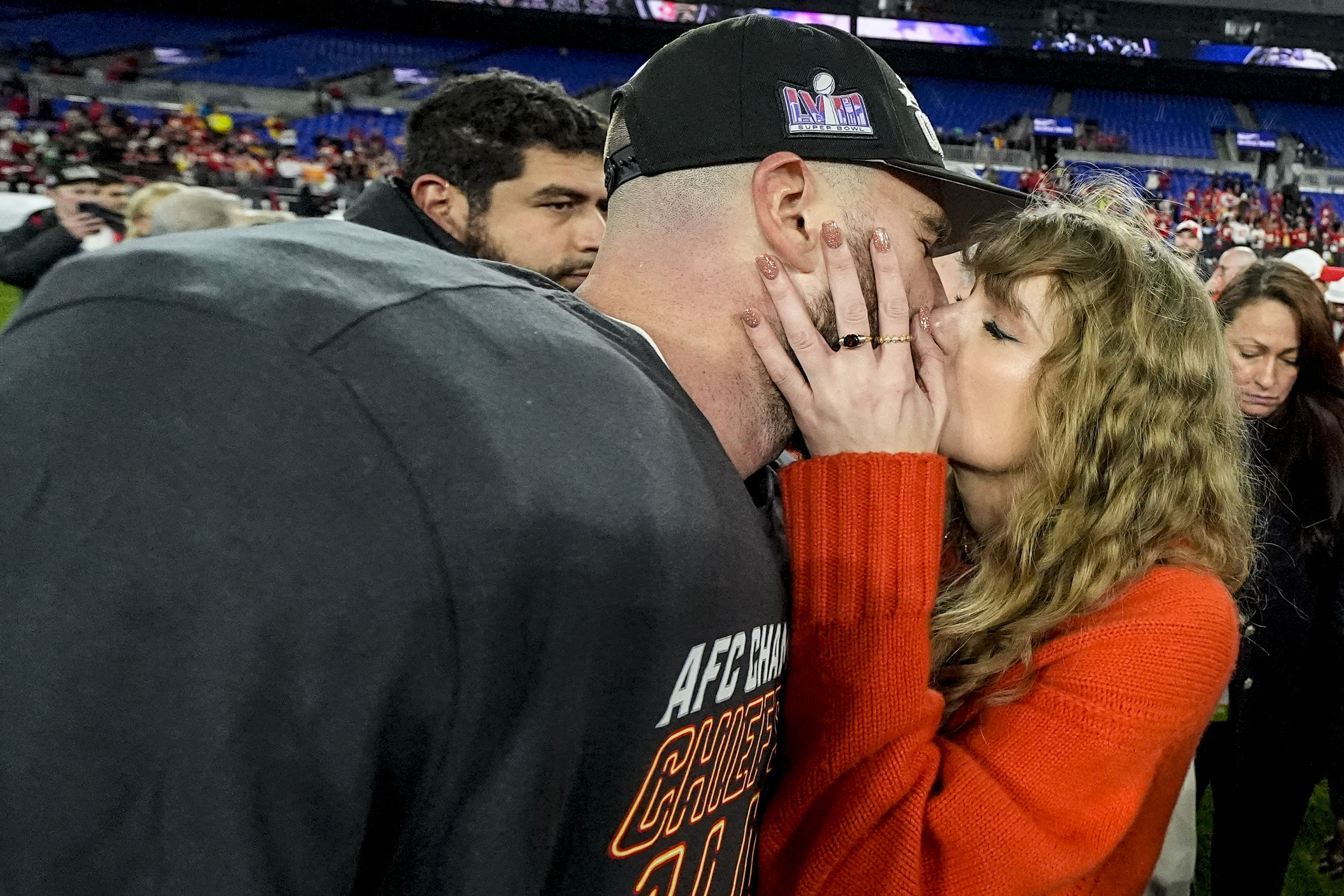 Taylor Swift kisses Kansas City Chiefs tight end Travis Kelce after an AFC Championship NFL football game against the Baltimore Ravens, Sunday, Jan. 28, 2024, in Baltimore. The Kansas City Chiefs won 17-10.