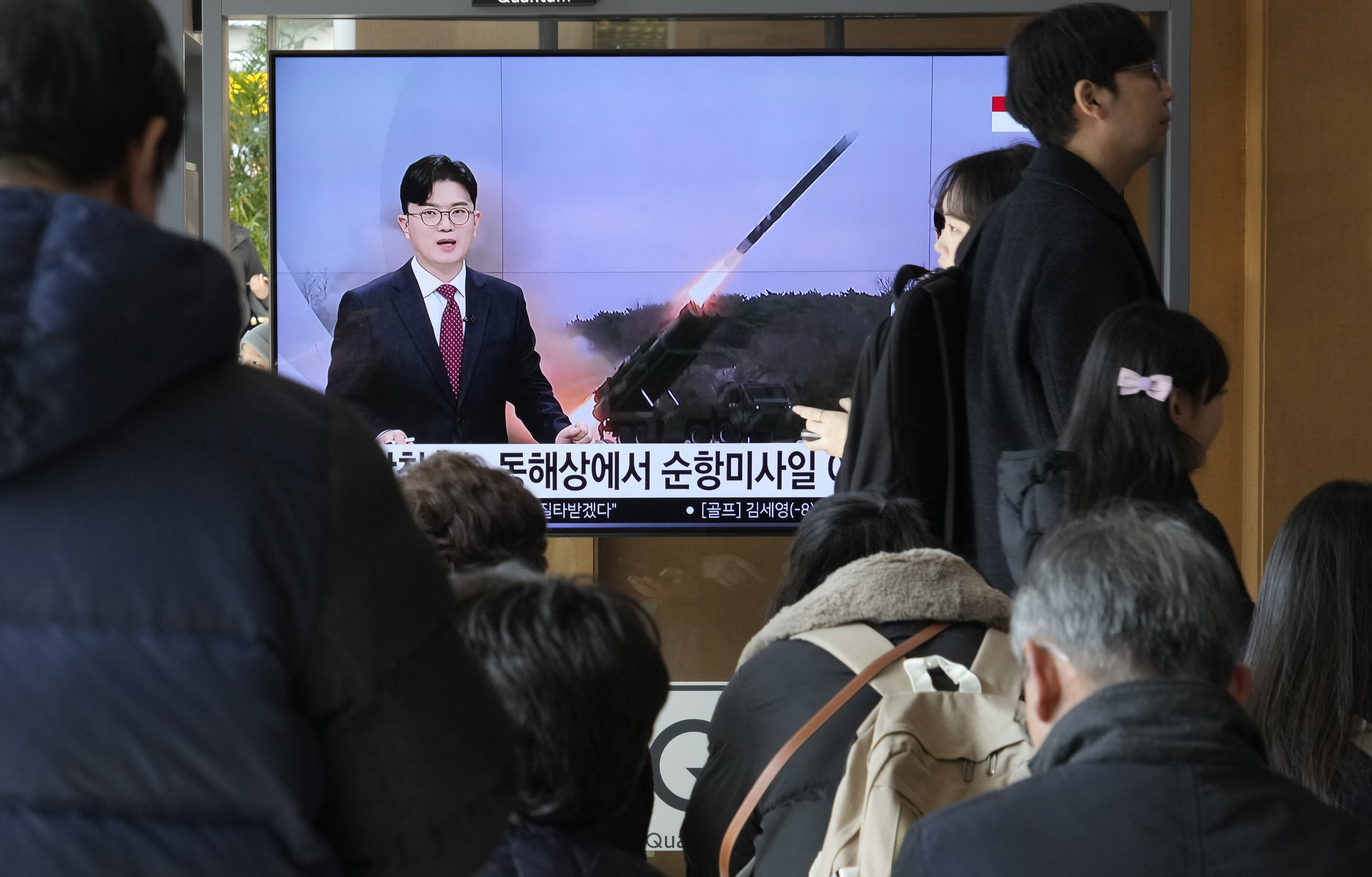 A TV screen shows North Korea's missile launch during a news program at the Seoul Railway Station in Seoul, South Korea, Sunday. North Korea fired several cruise missiles on the country's eastern coast, extending weapons tests worsening tensions with the United States, South Korea and Japan.