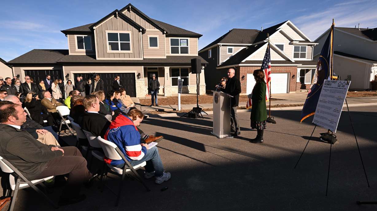 Gov. Spencer Cox and Lt. Gov. Deidre Henderson announce their state budget proposal at a press conference in West Haven on Dec. 5, 2023.
