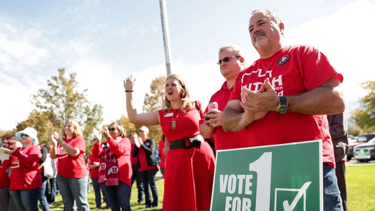 Roger Donohoe, with others, act in support of education legislation in Murray on Oct. 13, 2018. Payroll deduction of teachers' and public employees' union dues could continue under legislation approved by a House committee Friday.