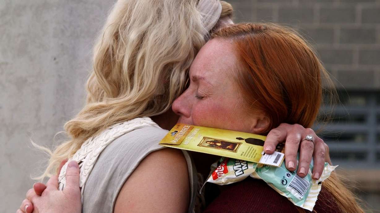 Tatum Merrill hugs a supporter after being released from the Utah County Jail in August 2023.