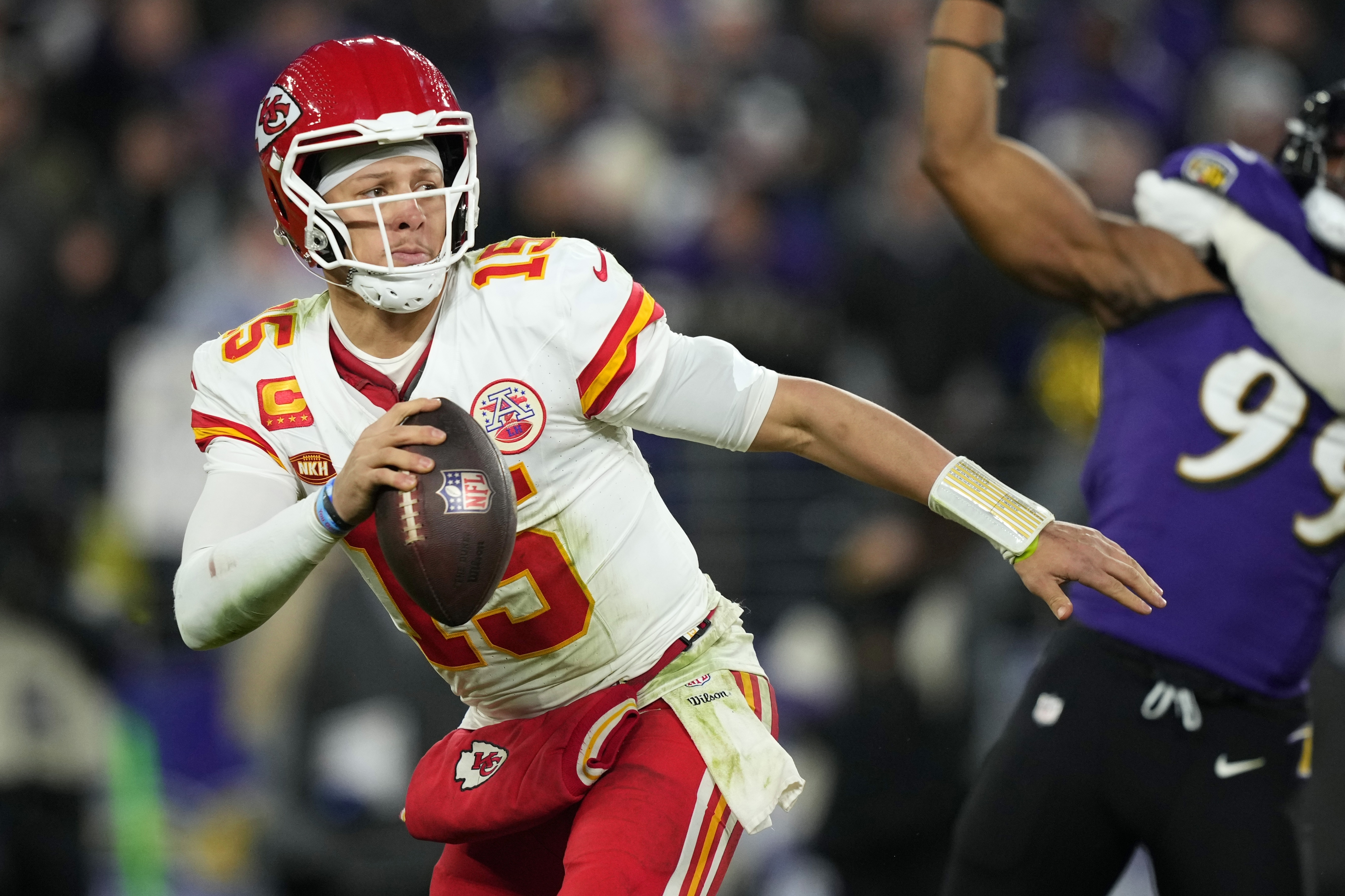 Kansas City Chiefs quarterback Patrick Mahomes (15) looks to pass during the second half of the AFC Championship NFL football game against the Baltimore Ravens, Sunday, Jan. 28, 2024, in Baltimore. 