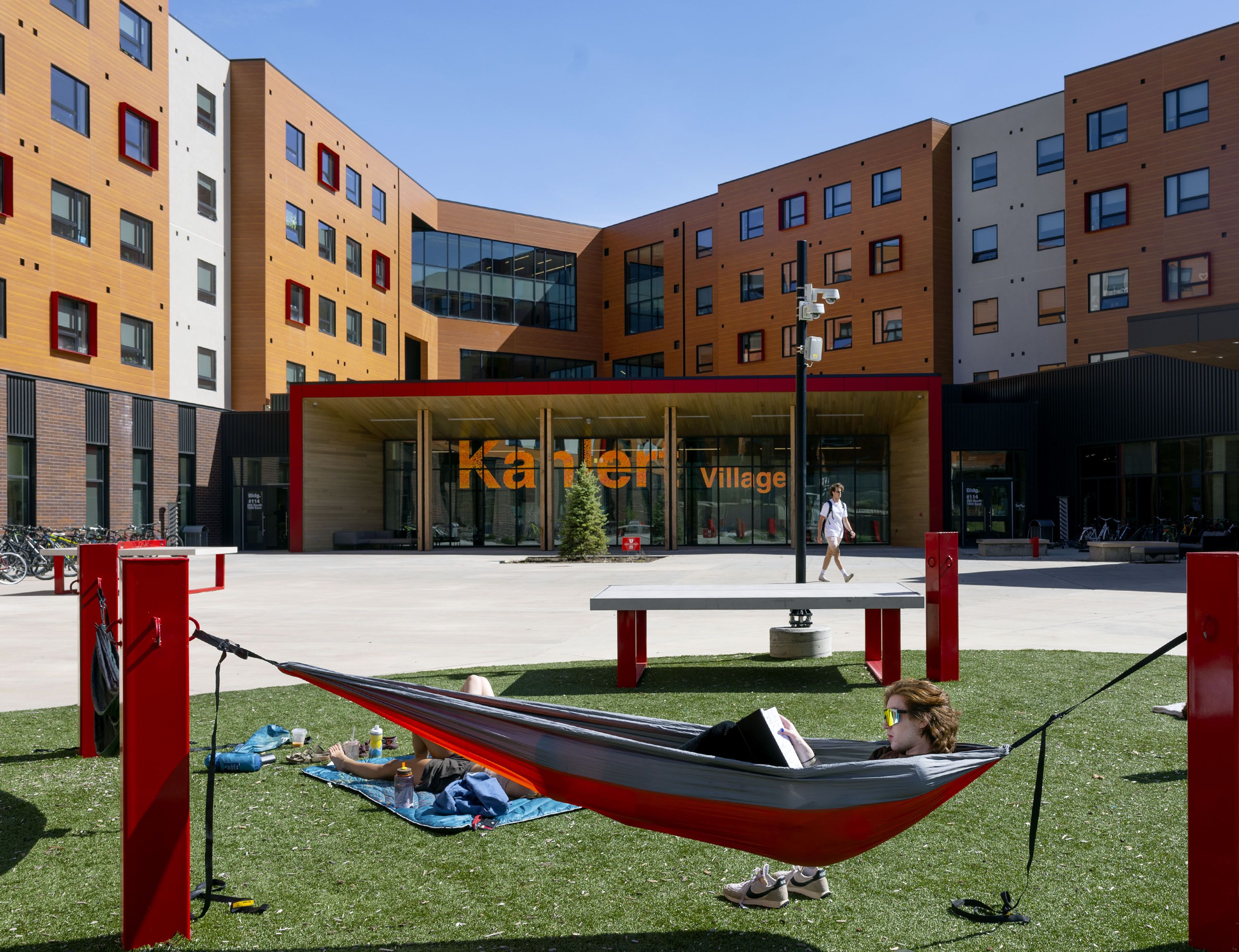First-year student Kieran Griffin reads in the courtyard of Kahlert Village at the University of Utah in Salt Lake City on April 26, 2023. The U. and other public colleges and universities in Utah are feeling the effects of declining confidence in institutions of higher education nationwide.