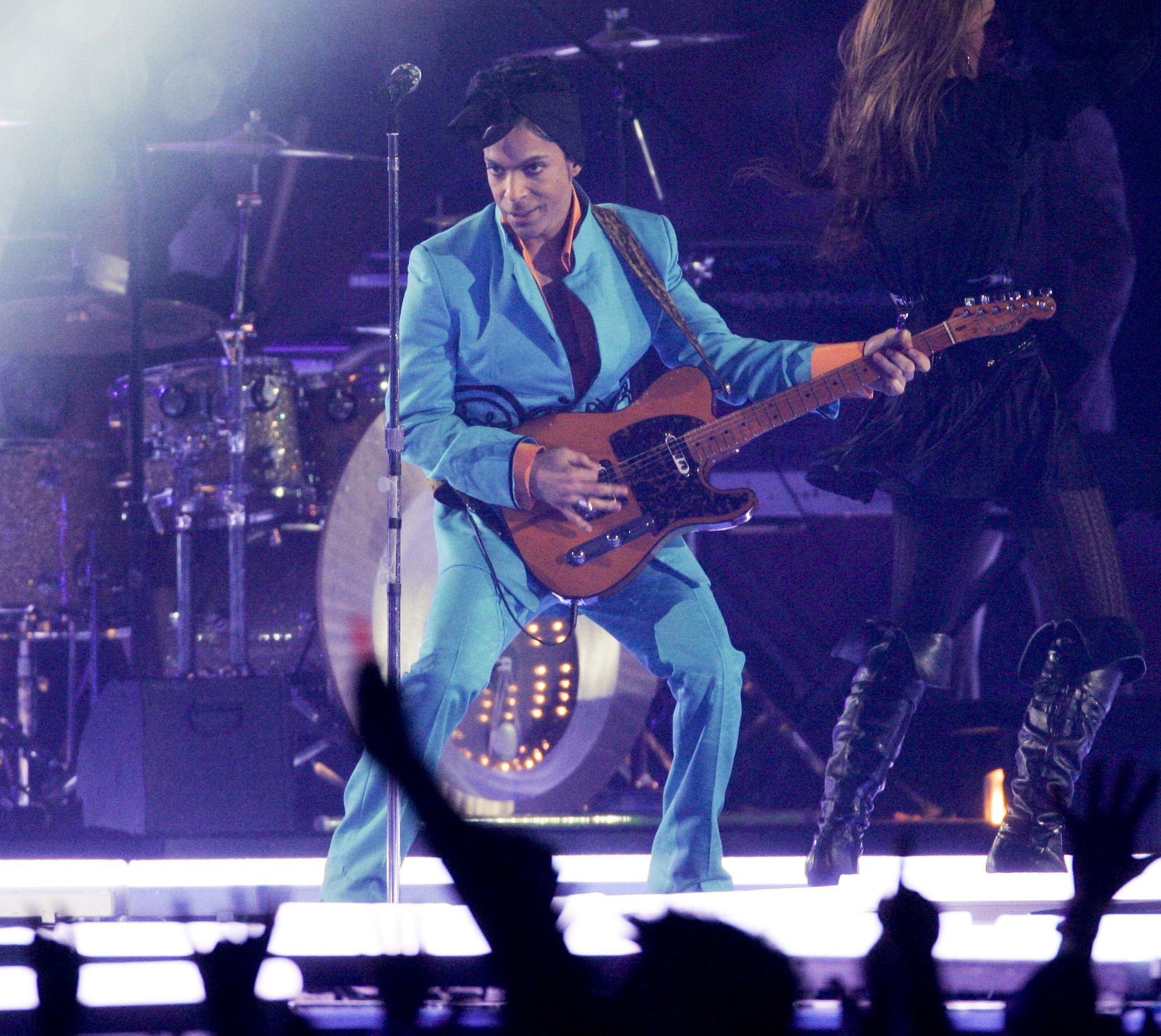 FILE - Prince performs during the halftime show at the Super Bowl XLI NFL football game at Dolphin Stadium in Miami on Sunday, Feb. 4, 2007. When the Super Bowl halftime show was born, high school and college marching bands took center field. But over the years, the intermission during the NFL’s championship game has turned into one of sports’ biggest spectacles with superstar performances. 