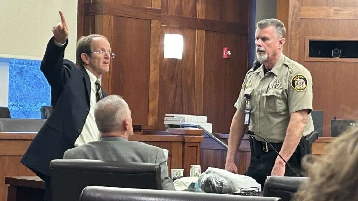Prosecutor Ryan Shaum speaks to a bailiff during recess in the trial of defendant Julie Ann Budge, who was facing second-degree felony vehicle homicide in connection with a fatal crash in Washington City on April 9, 2022.