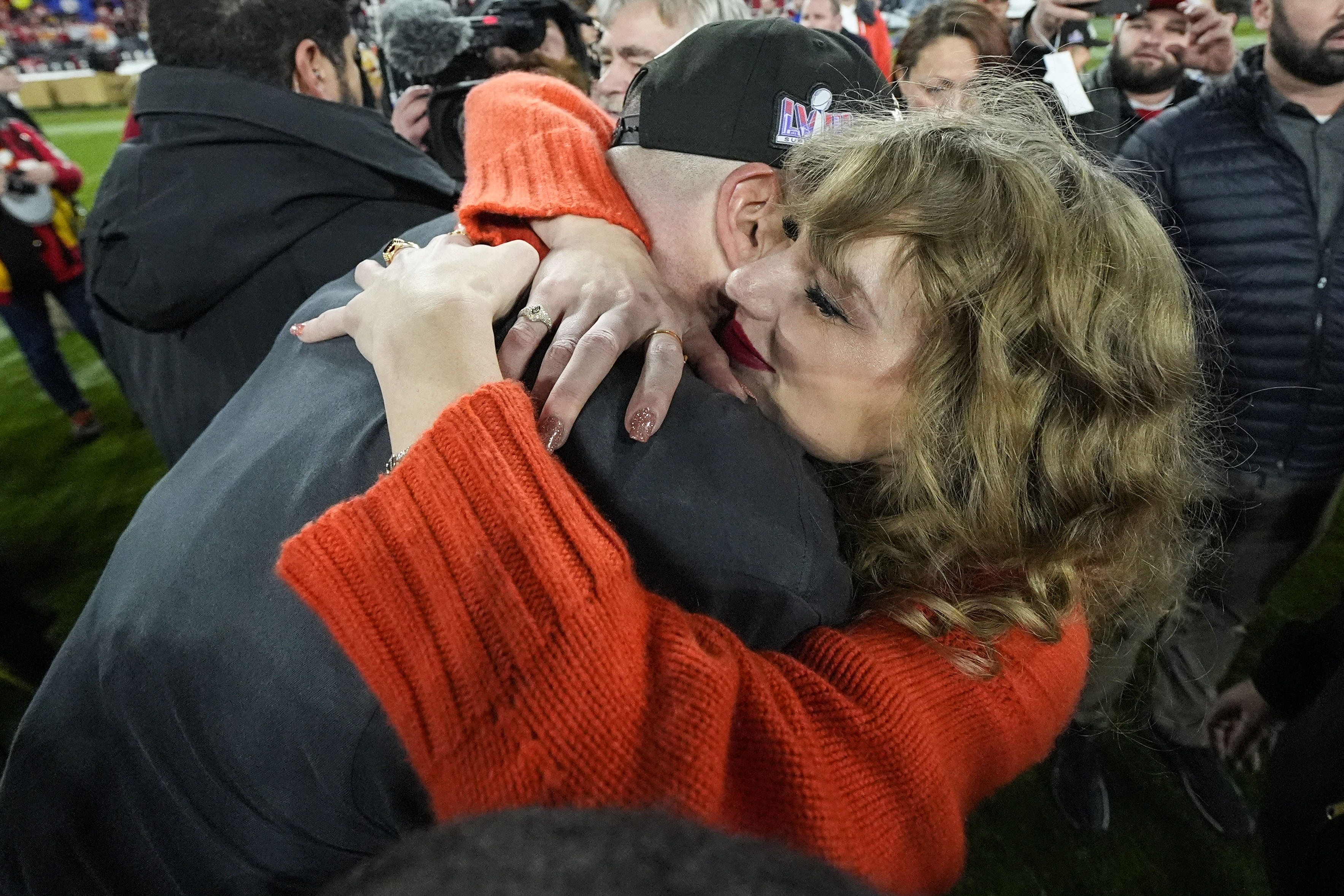 Taylor Swift speaks withKansas City Chiefs tight end Travis Kelce after an AFC Championship NFL football game against the Baltimore Ravens, Sunday, Jan. 28, 2024, in Baltimore. The Kansas City Chiefs won 17-10. 