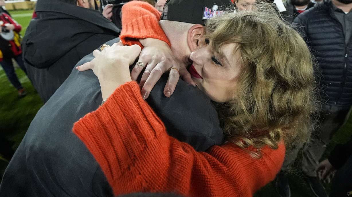 Taylor Swift speaks withKansas City Chiefs tight end Travis Kelce after an AFC Championship NFL football game against the Baltimore Ravens, Sunday, Jan. 28, 2024, in Baltimore. The Kansas City Chiefs won 17-10.