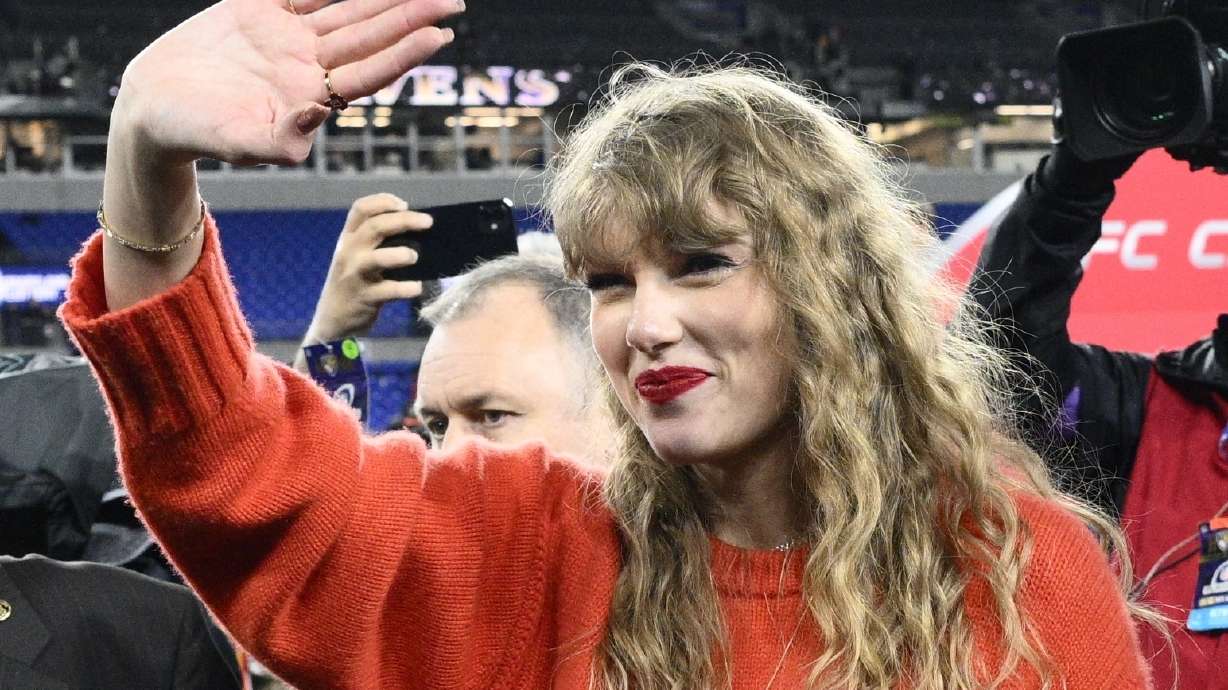 Taylor Swift waves after the AFC Championship NFL football game between the Baltimore Ravens and the Kansas City Chiefs, Sunday, Jan. 28, 2024, in Baltimore.