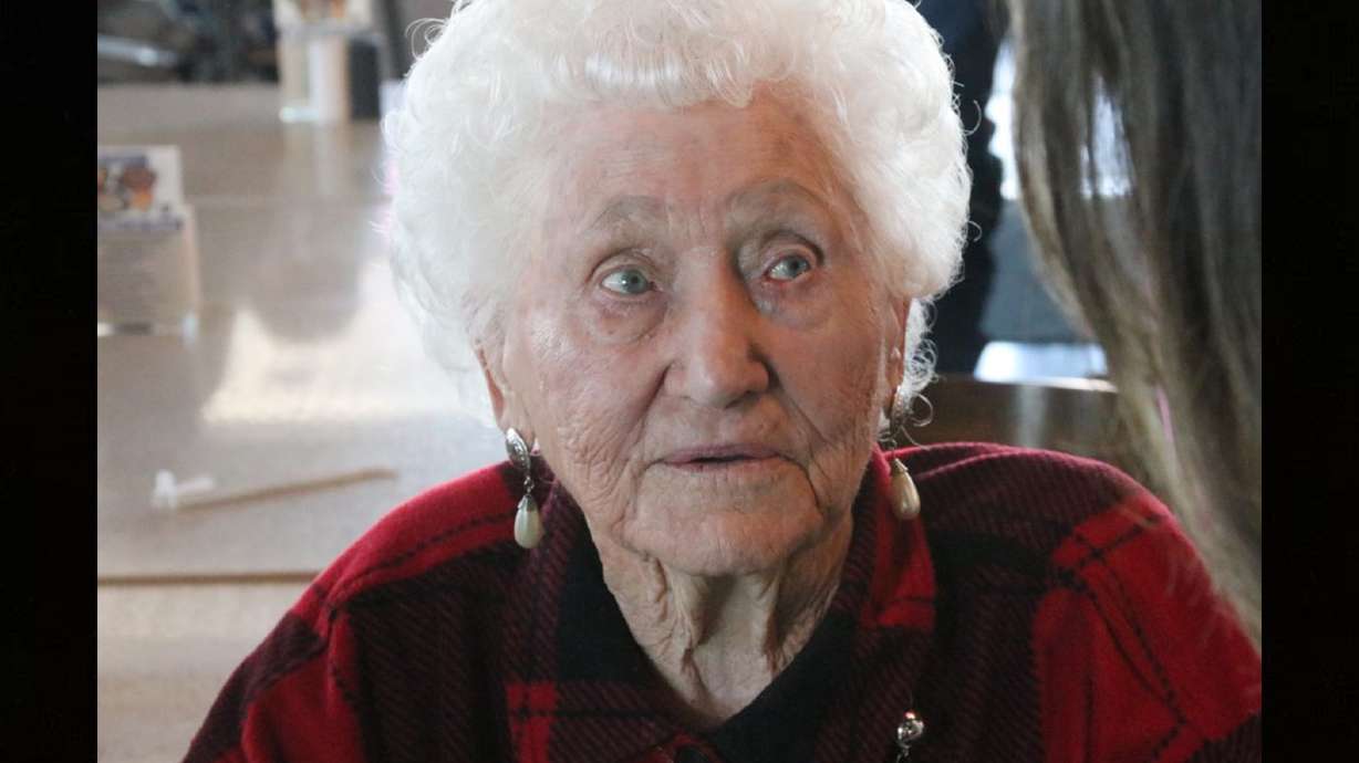 Piute County resident Irva Sudweeks, who turned 105 on Jan. 24, greets family members during her birthday party, Cedar City, Jan. 27.