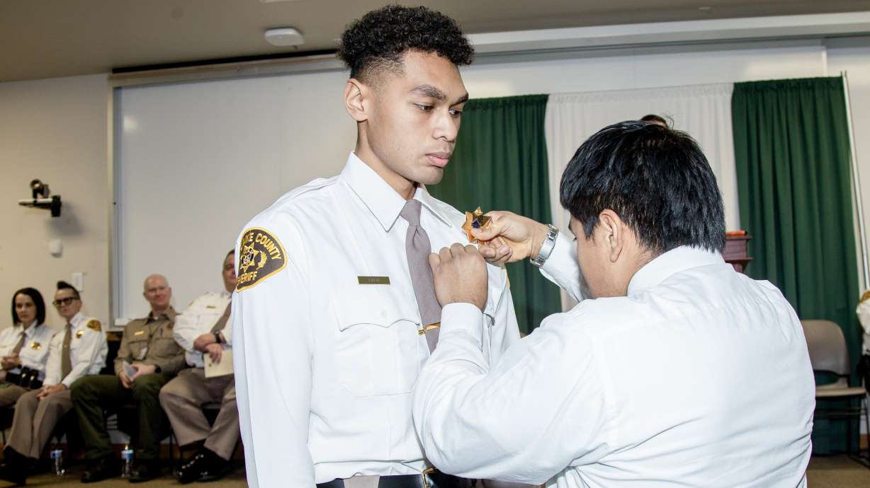 Emaloni Takitoa Lutui graduates from the Salt Lake County sheriff's academy on Jan. 11. Lutui is remembered as a hero after he died Monday saving his girfriend from an icy reservoir.