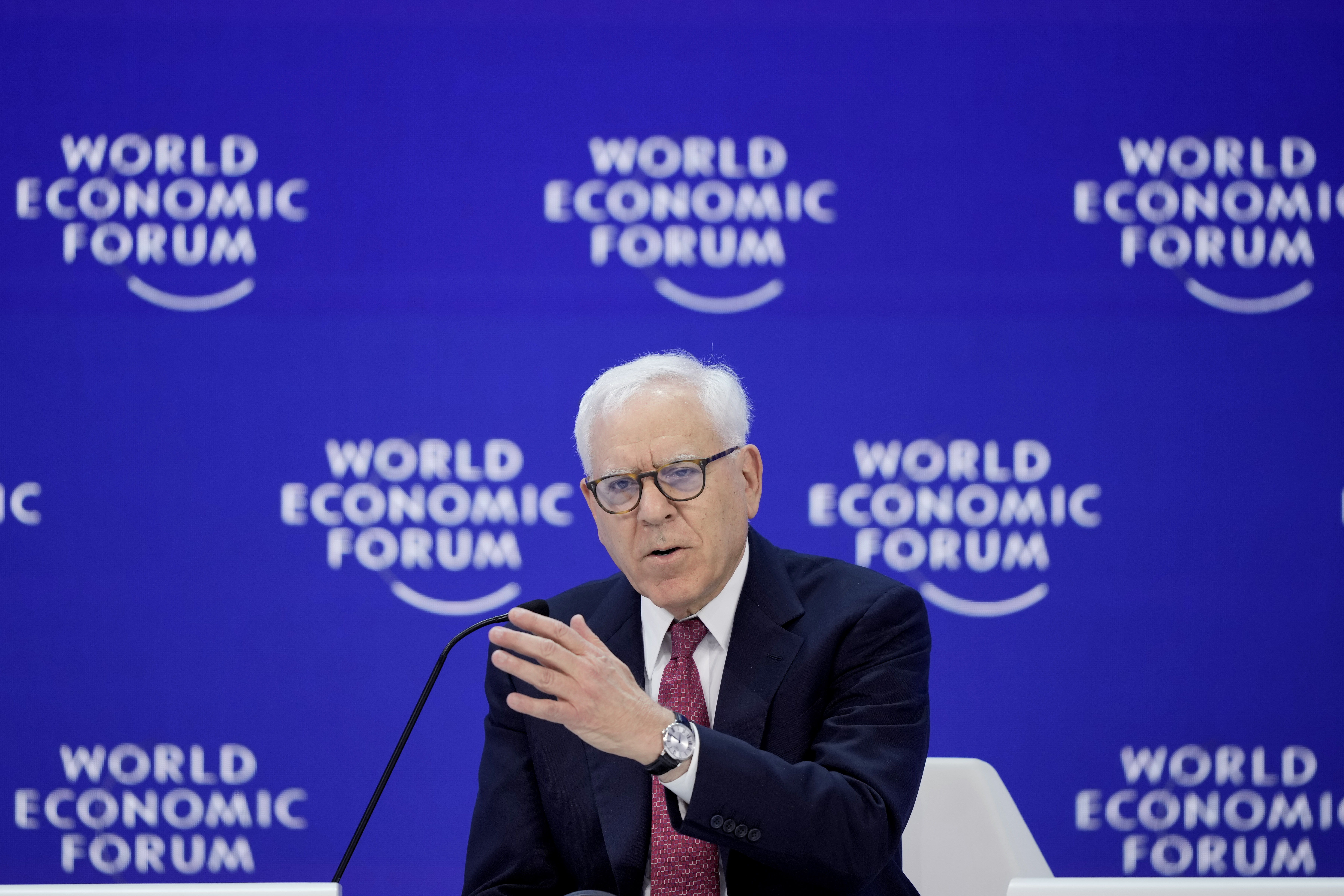 Co-founder and co-chairman of the private equity firm The Carlyle Group David Rubenstein speaks in the panel "The Global Economic Outlook" on the last day of the forum's Annual Meeting in Davos, Switzerland, Friday, Jan. 19, 2024. 