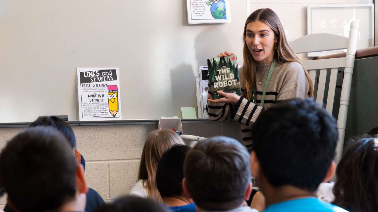 Jackie Rigby, a student teacher, reads to her classroom of third grade students at Whittier Elementary School in West Valley City on Tuesday. Rigby is a student at the University of Utah studying elementary education.