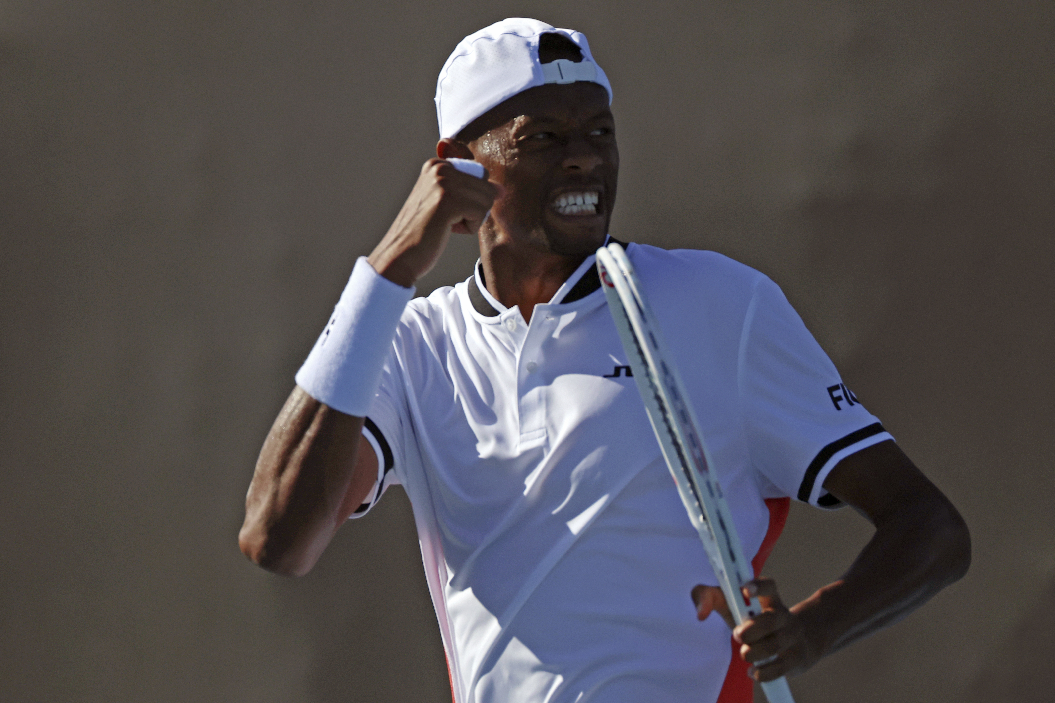 Christopher Eubanks of the U.S. reacts after winning the second set against Taro Daniel of Japan during their first round match at the Australian Open tennis championships at Melbourne Park, Melbourne, Australia, Monday, Jan. 15, 2024.