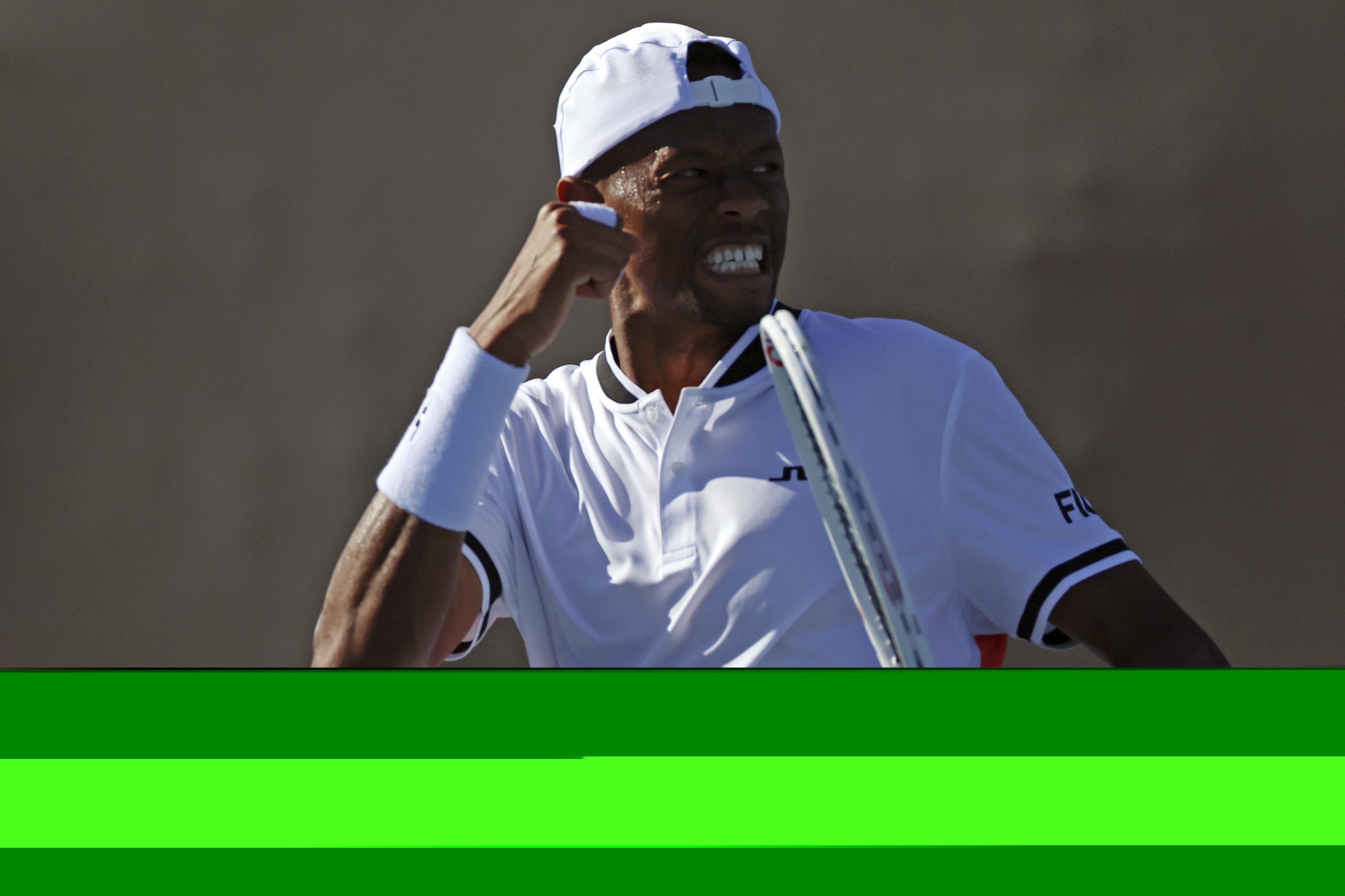 Christopher Eubanks of the U.S. reacts after winning the second set against Taro Daniel of Japan during their first round match at the Australian Open tennis championships at Melbourne Park, Melbourne, Australia, Monday, Jan. 15, 2024. 