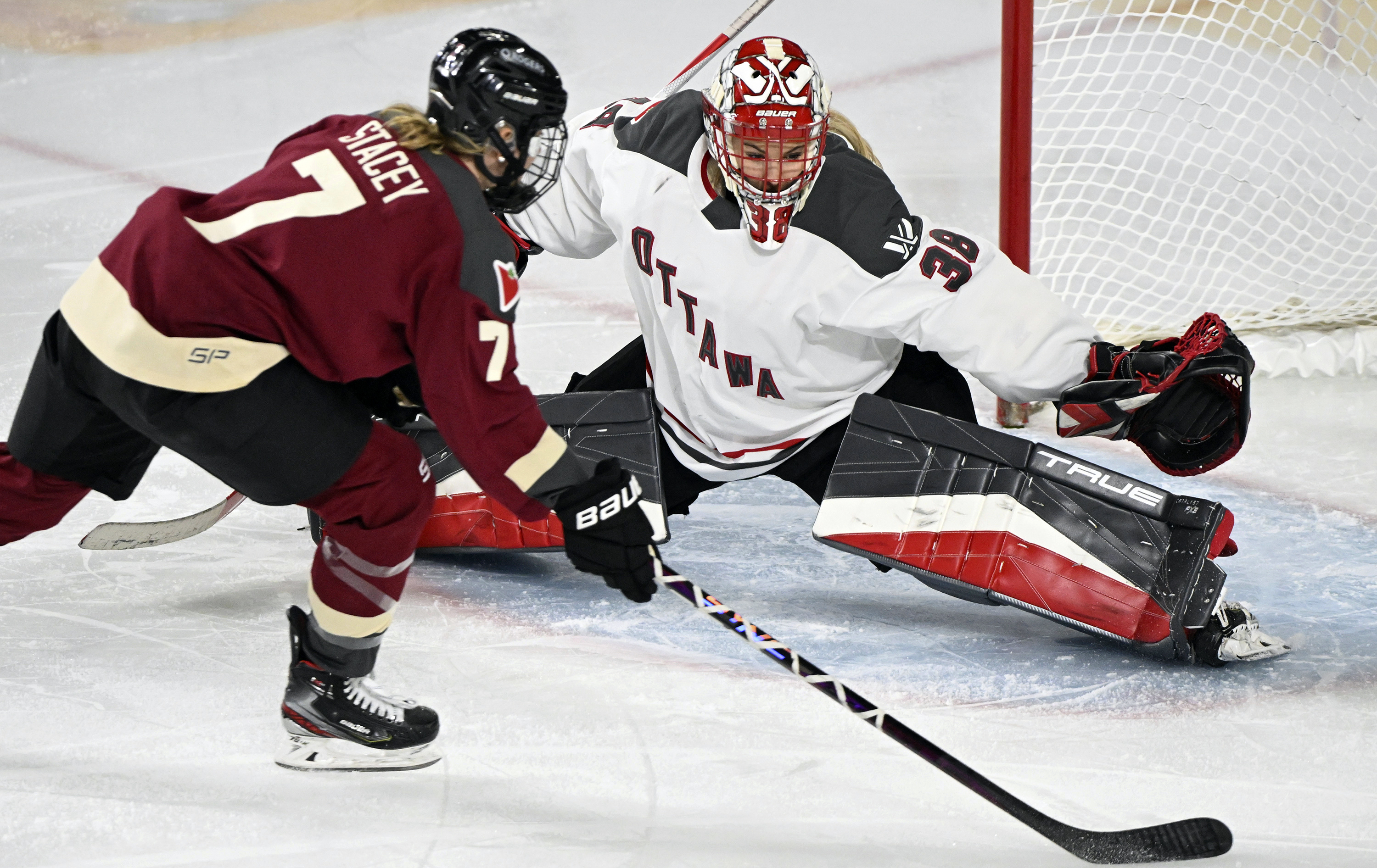 Montreal's Laura Stacey (7) takes a penaly shot on Ottawa goaltender Emerance Maschmeyer during the second period of a PWHL hockey game in Laval, Quebec, Saturday, Jan. 27, 2024.