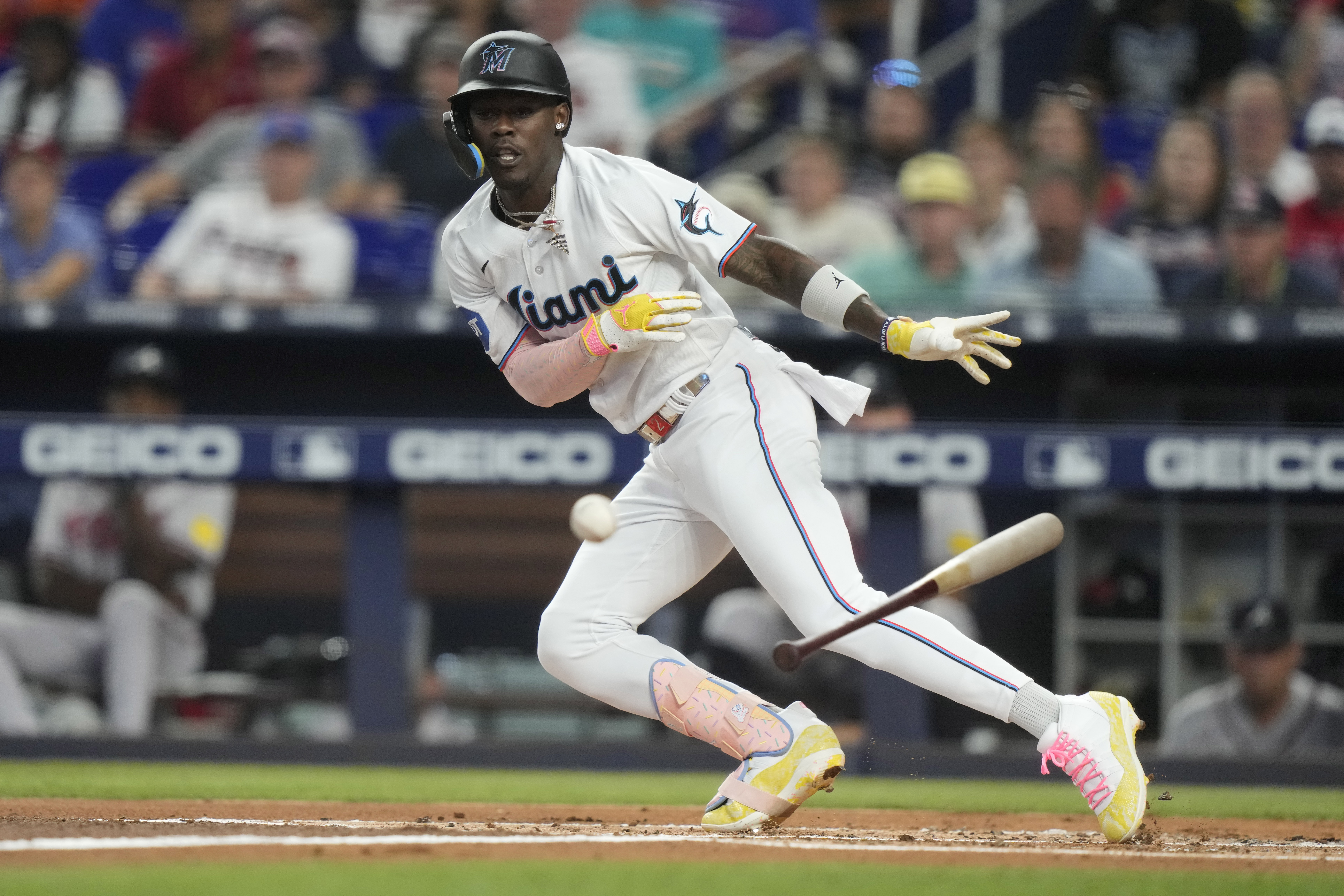 FILE -Miami Marlins' Jazz Chisholm Jr. attempts a bunt during the first inning of a baseball game against the Atlanta Braves, Sunday, Sept. 17, 2023, in Miami. Jazz Chisholm Jr. and the Miami Marlins went to salary arbitration Wednesday, Jan. 31, 2024 when the outfielder asked a three-person panel to be paid $2.9 million this year and the team asked he be given $2,625,000.