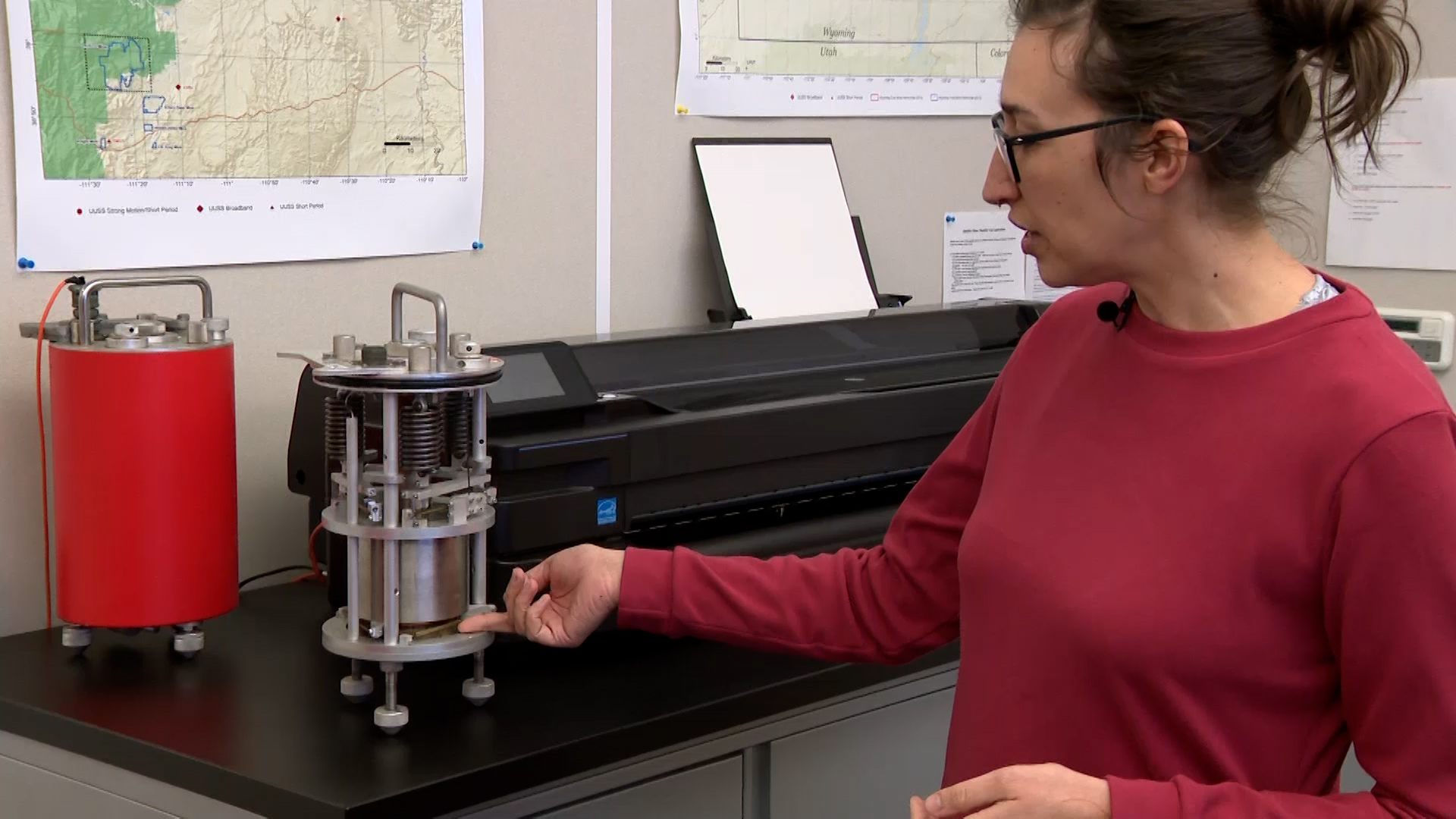 Emily Morton shows the new equipment that would be used for the updated system on Thursday.