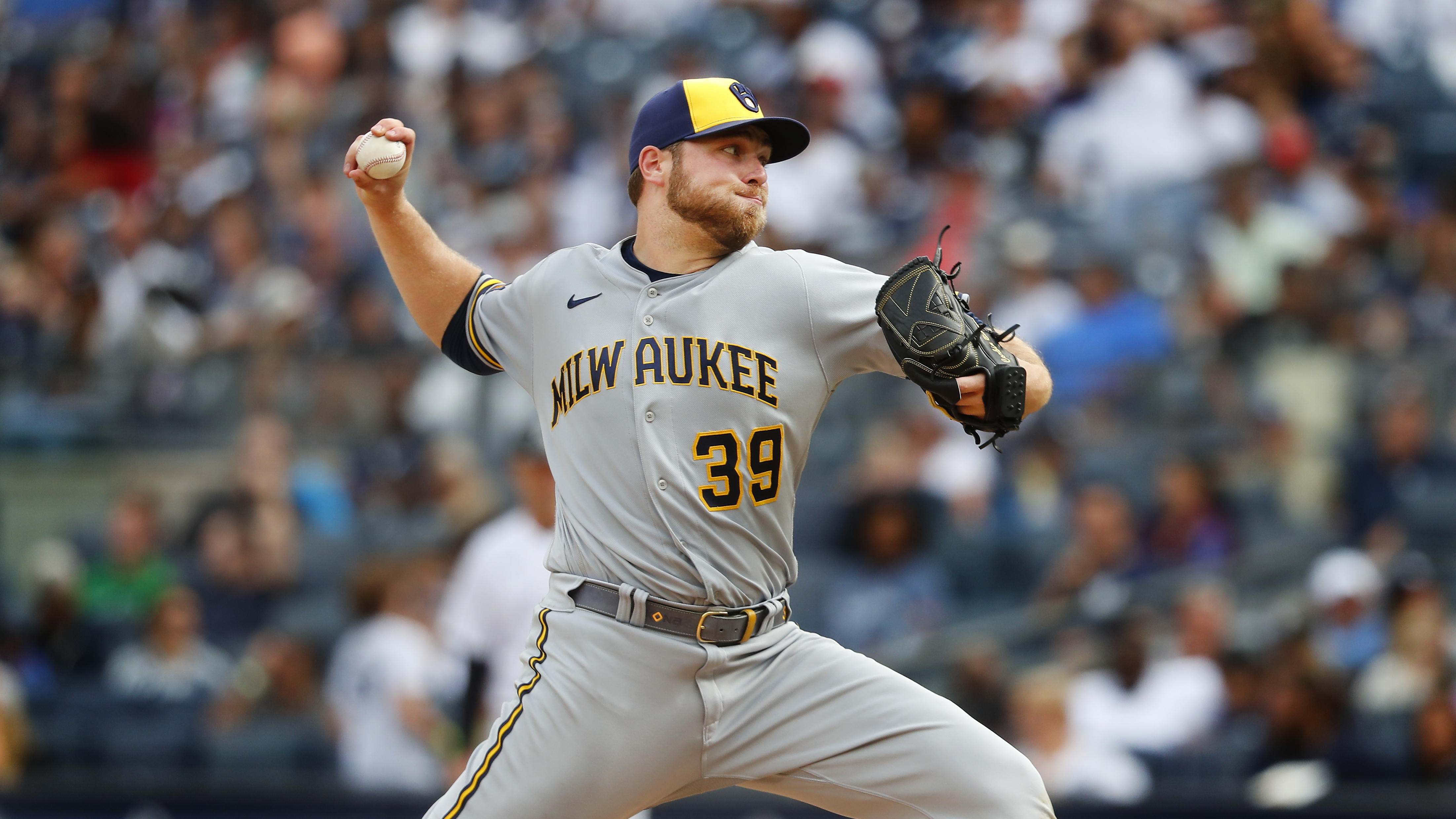 FILE -Milwaukee Brewers starting pitcher Corbin Burnes (39) throws against the New York Yankees during the eight inning of a baseball game, Sunday, Sept.10, 2023, in New York. The Milwaukee Brewers traded All-Star right-hander Corbin Burnes to the Baltimore Orioles on Thursday, Feb. 1, 2024 for left-hander DL Hall, infield prospect Joey Ortiz and a competitive balance draft pick.