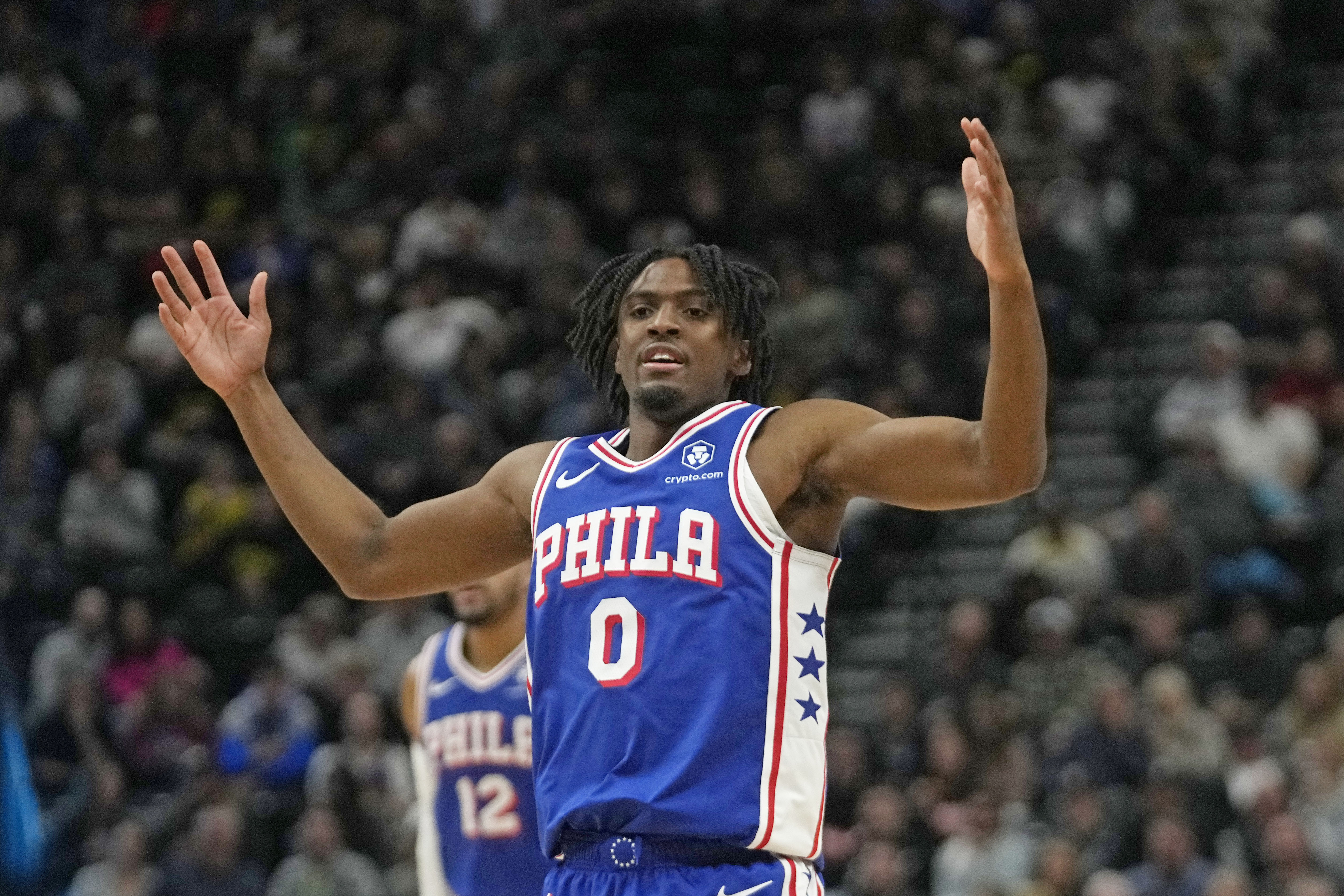 Philadelphia 76ers guard Tyrese Maxey (0) reacts after scoring against the Utah Jazz during the first half of an NBA basketball game Thursday, Feb. 1, 2024, in Salt Lake City. 